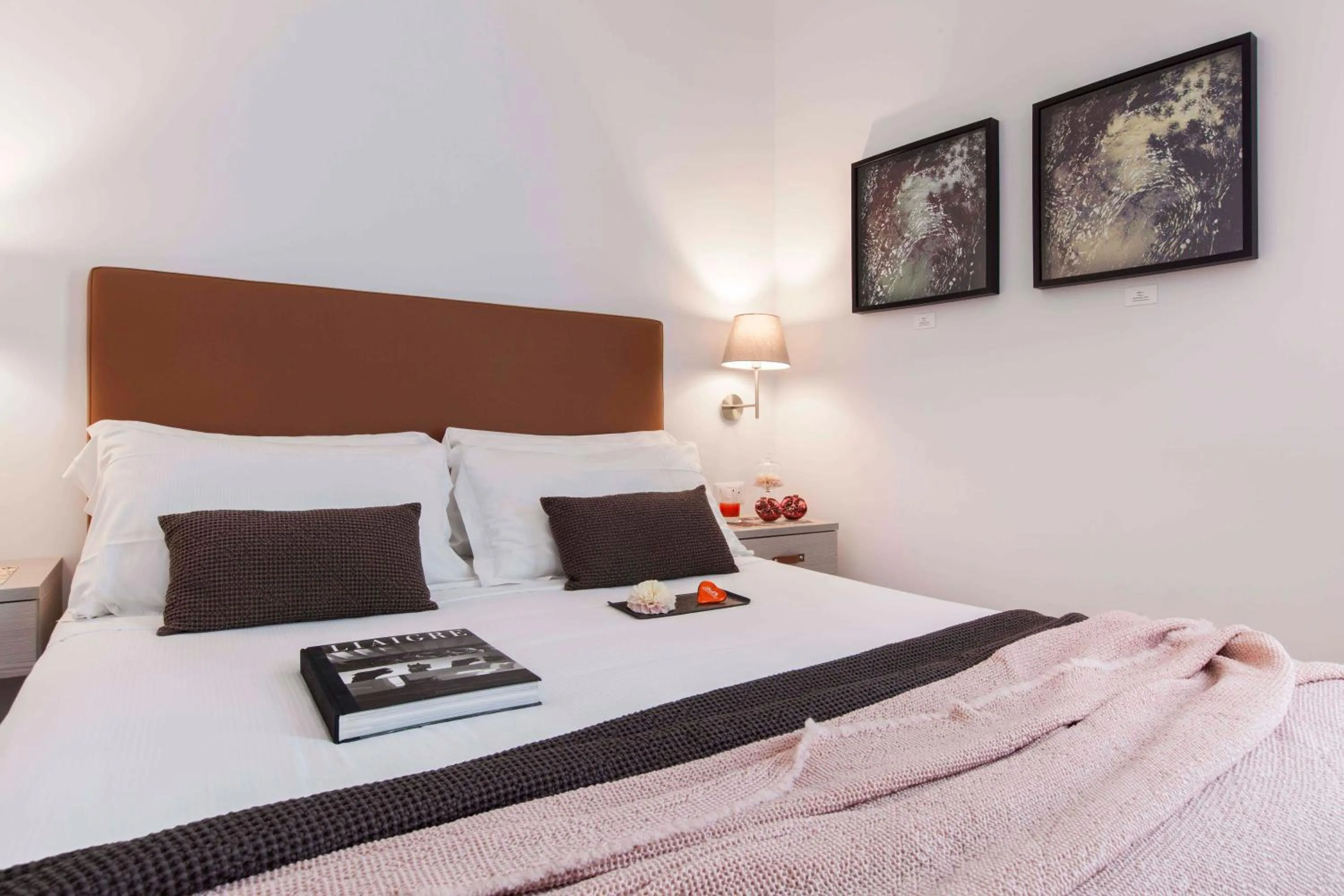 Bed in Giuturna Boutique Hotel