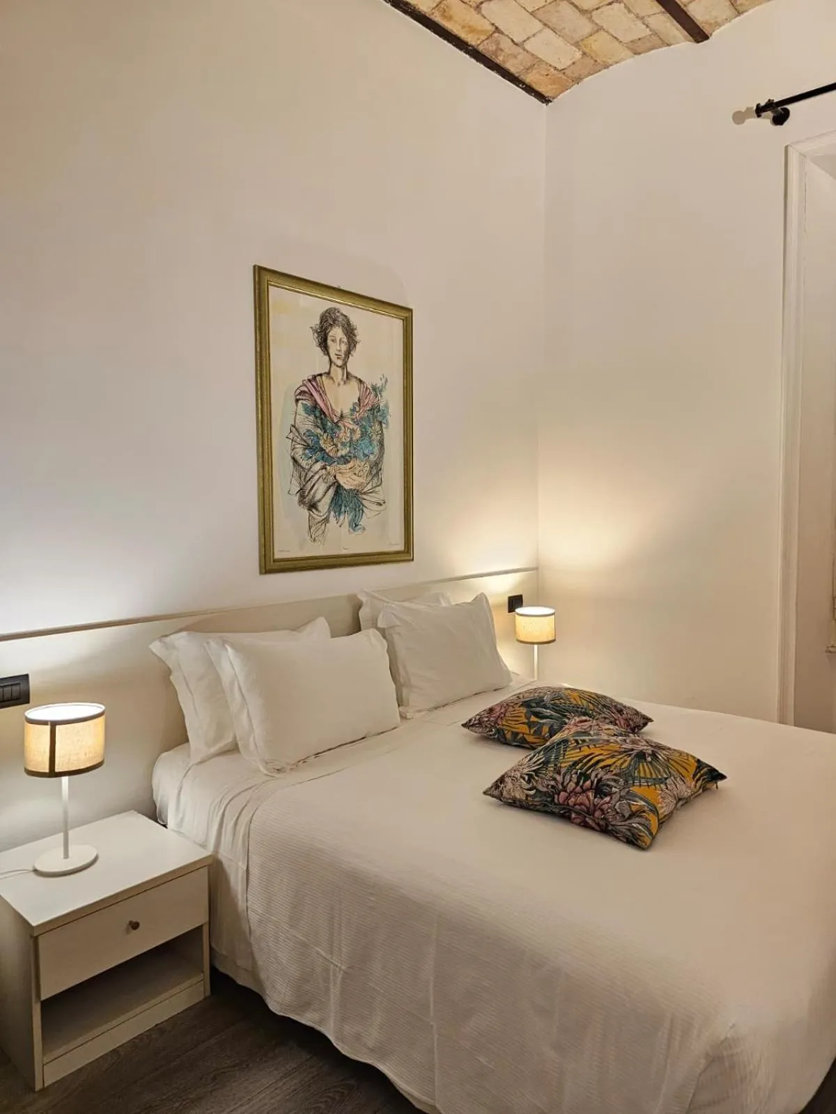 Bed in Giuturna Boutique Hotel
