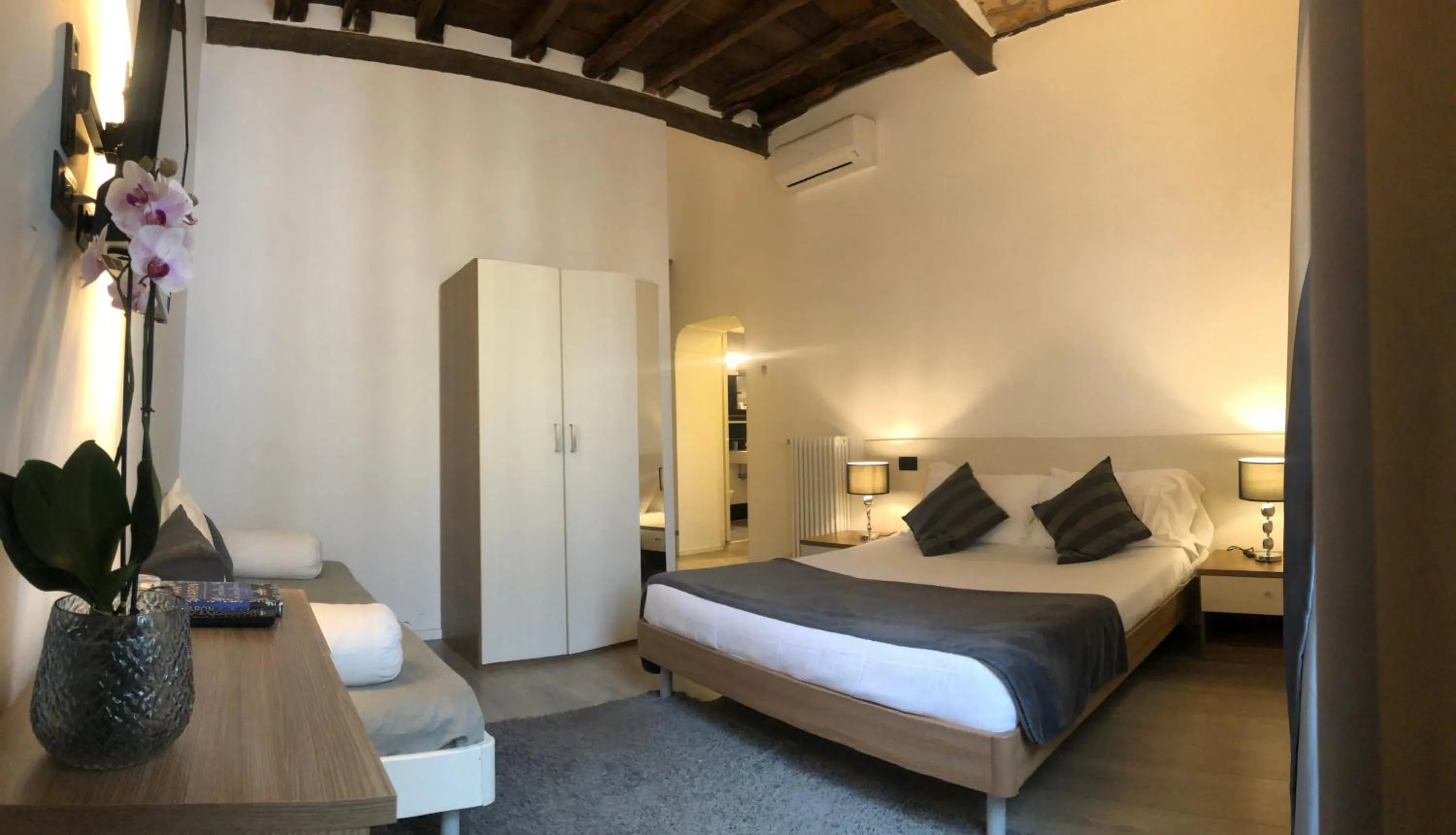 Bed in Giuturna Boutique Hotel
