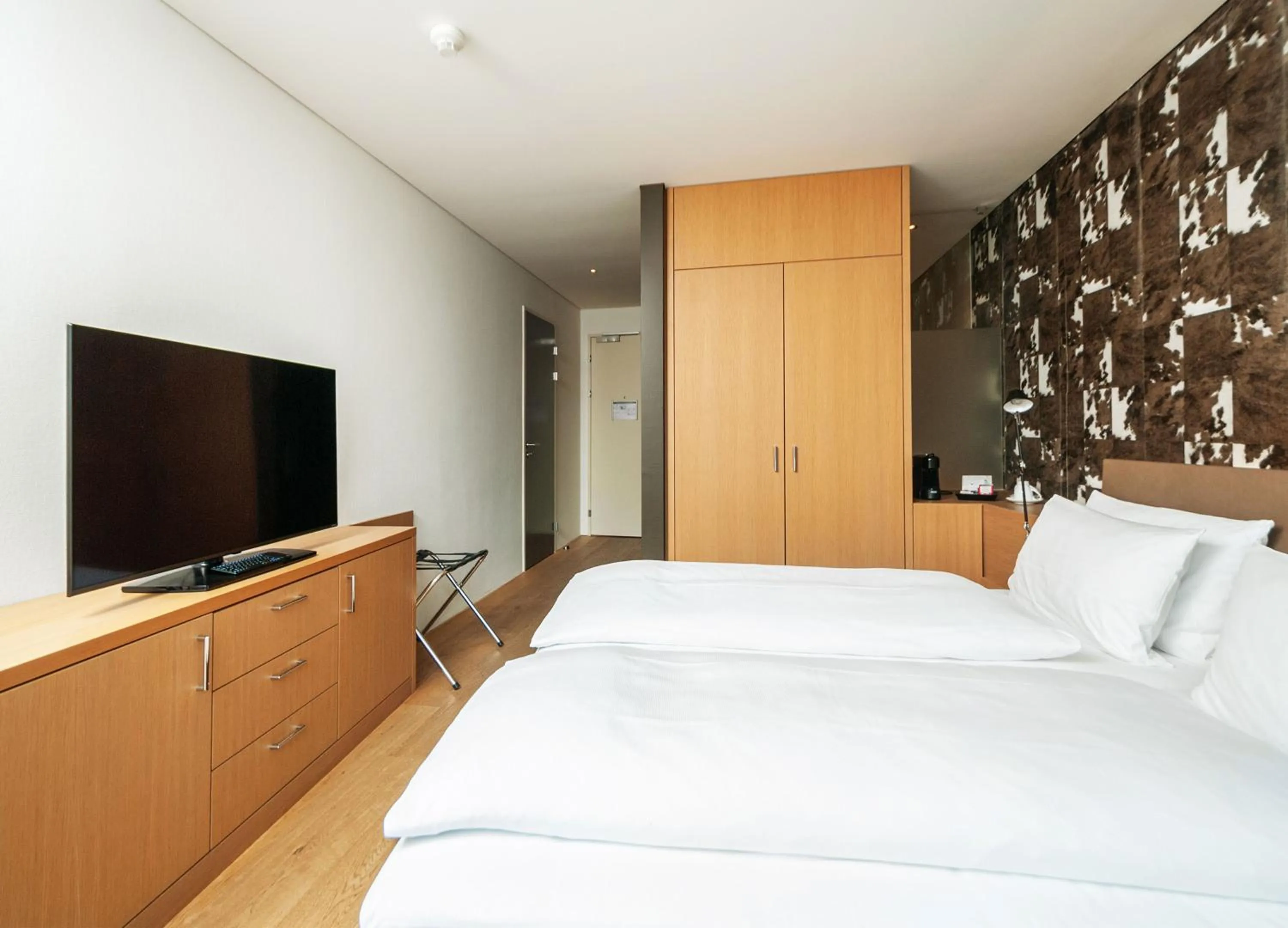 Bedroom, Bed in Tailormade Hotel SIHLPARK Schindellegi