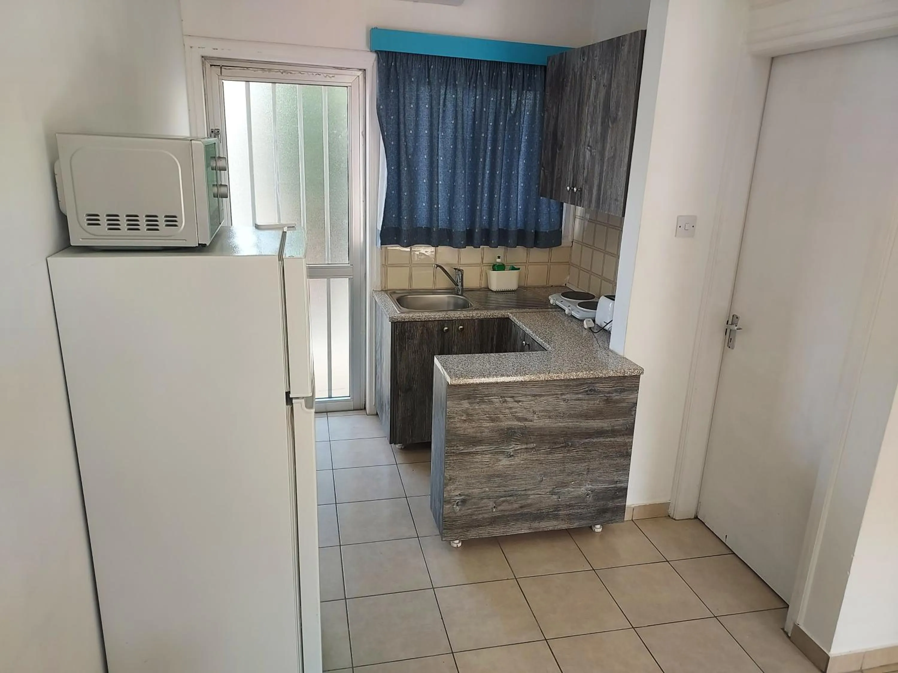 Kitchen or kitchenette in Sea Apartments