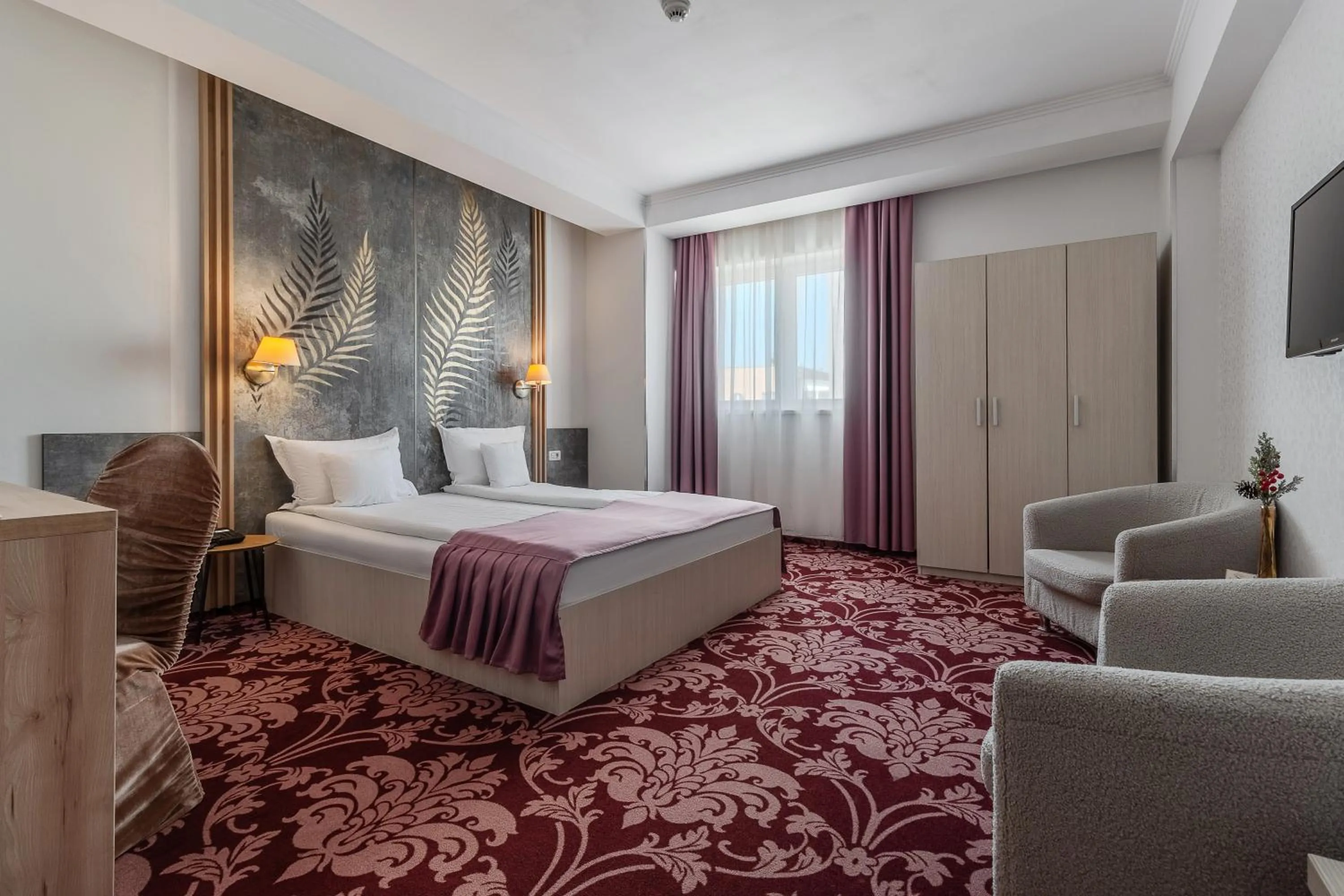 Bed in Hotel Nevis Wellness & SPA