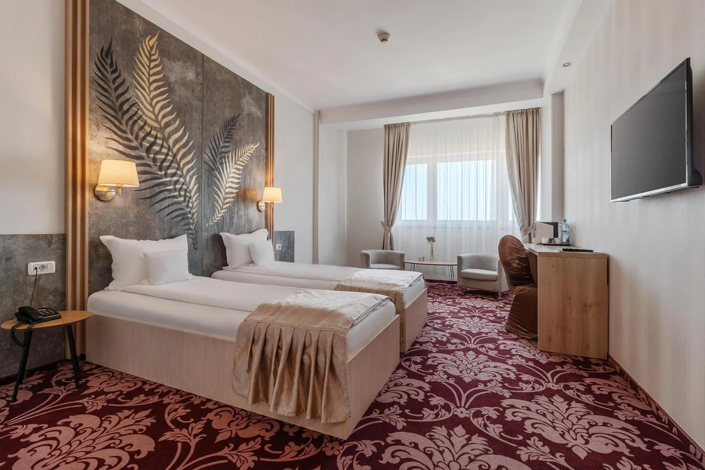 Bed in Hotel Nevis Wellness & SPA