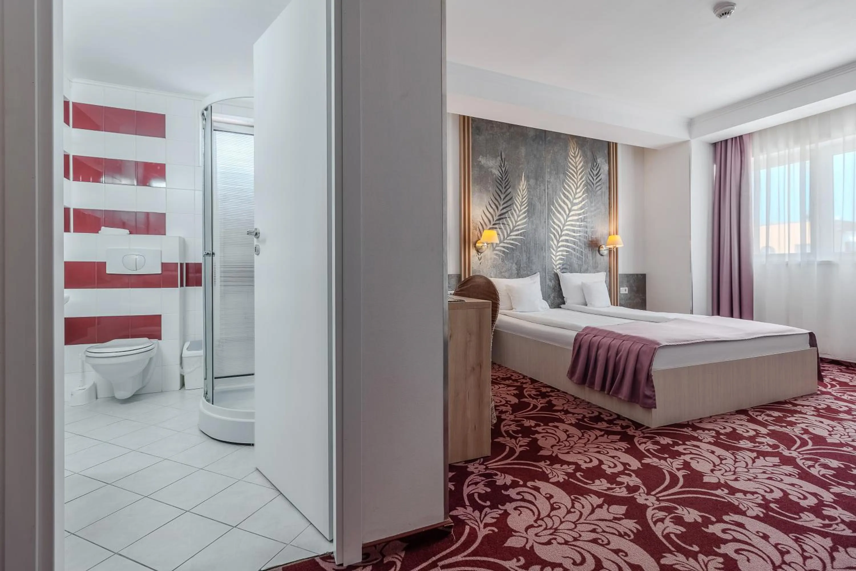 Bed in Hotel Nevis Wellness & SPA