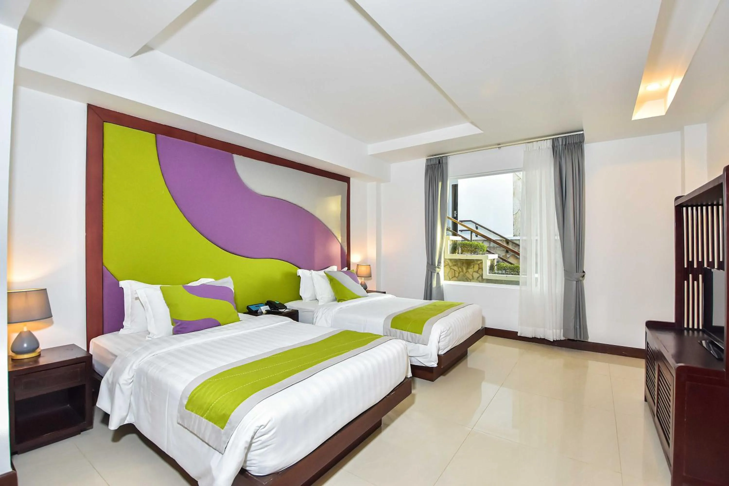 Bed in Independence Hotel Resort & Spa