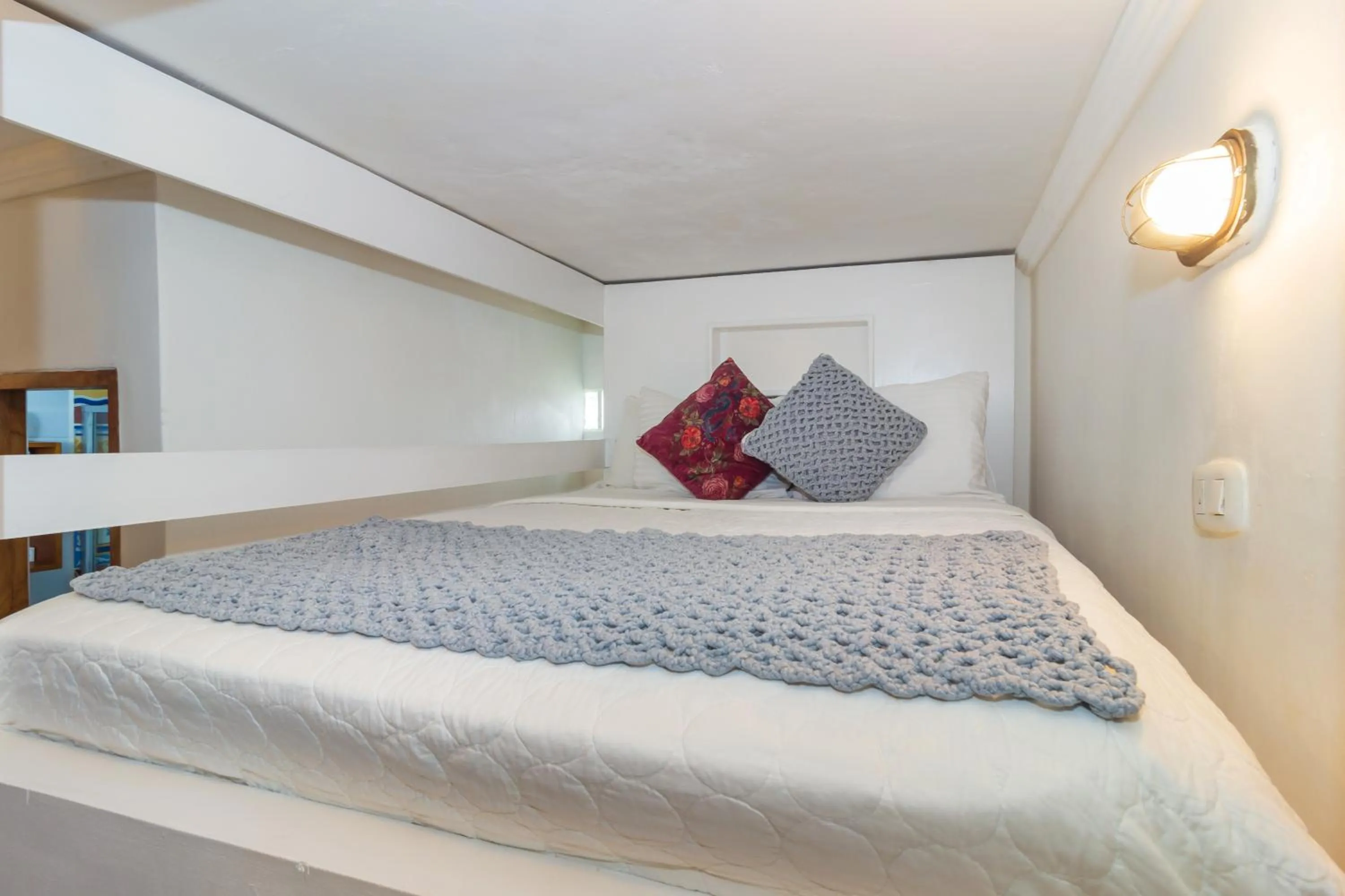 Bed in Voilá Signature Casa Isabel