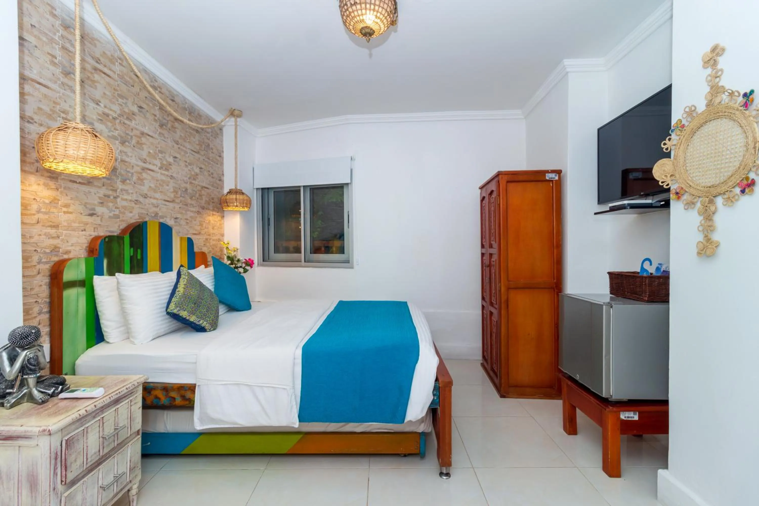 Bed in Voilá Signature Casa Isabel