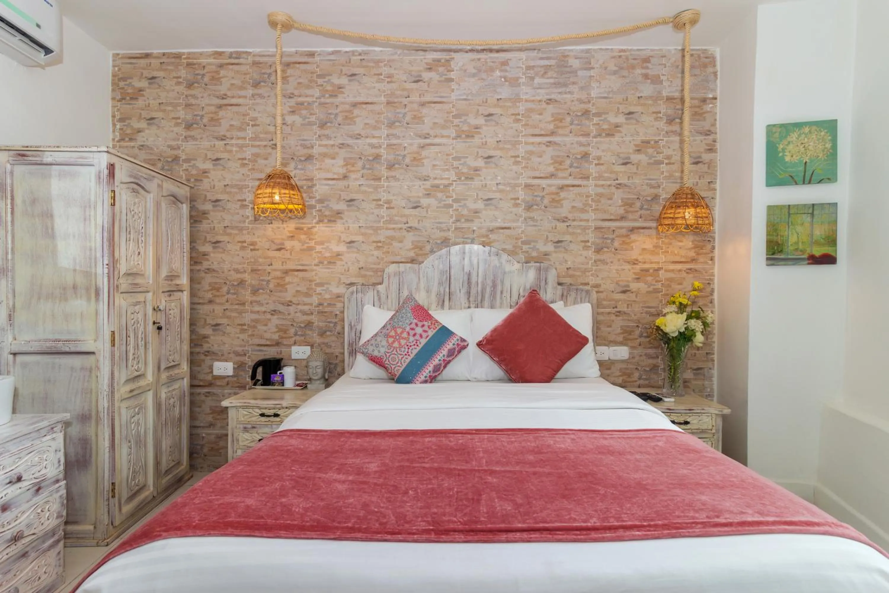 Bed in Voilá Signature Casa Isabel