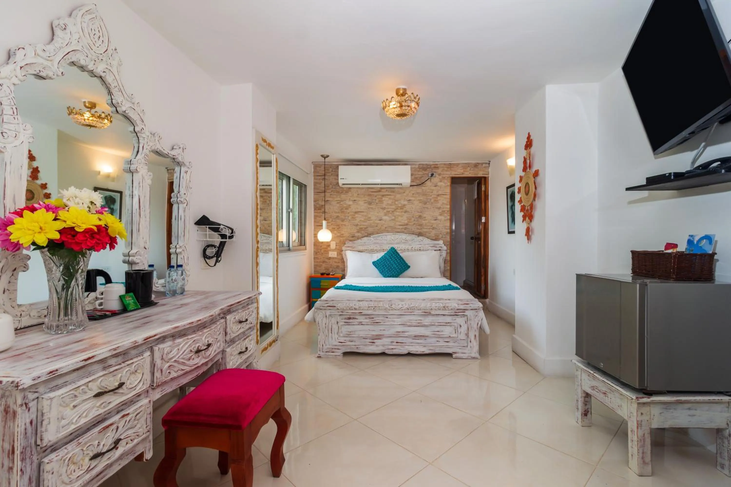 Bed in Voilá Signature Casa Isabel