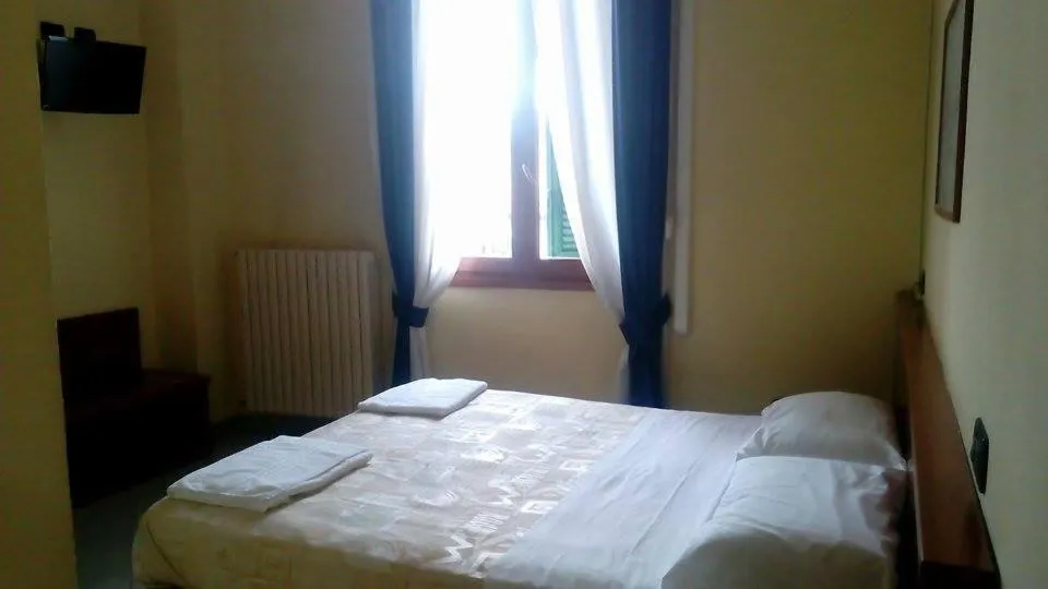 Bed in Hotel Greco