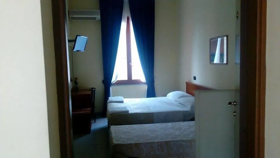 Bed in Hotel Greco