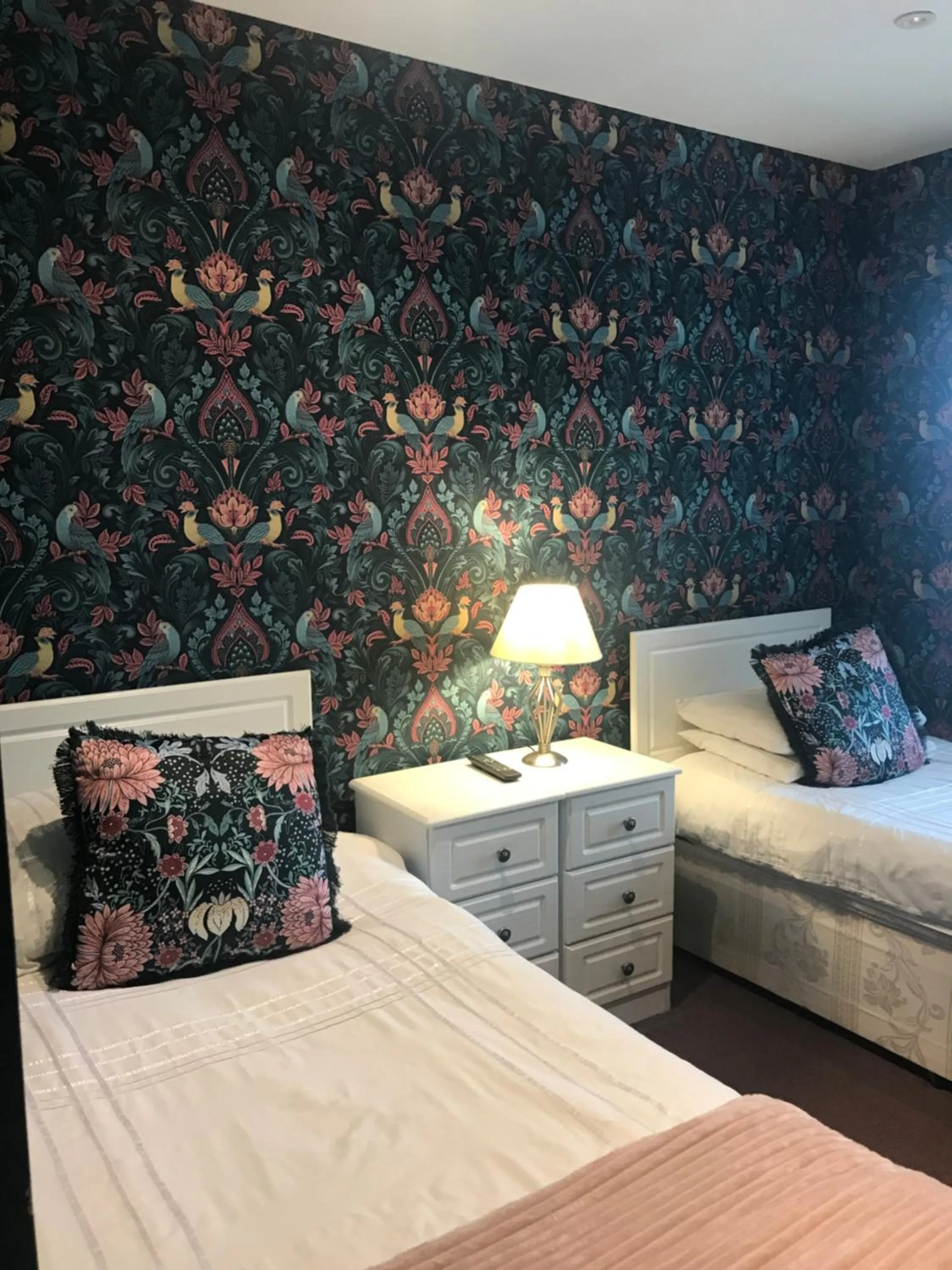 Bed in Acacia Villas Guest House