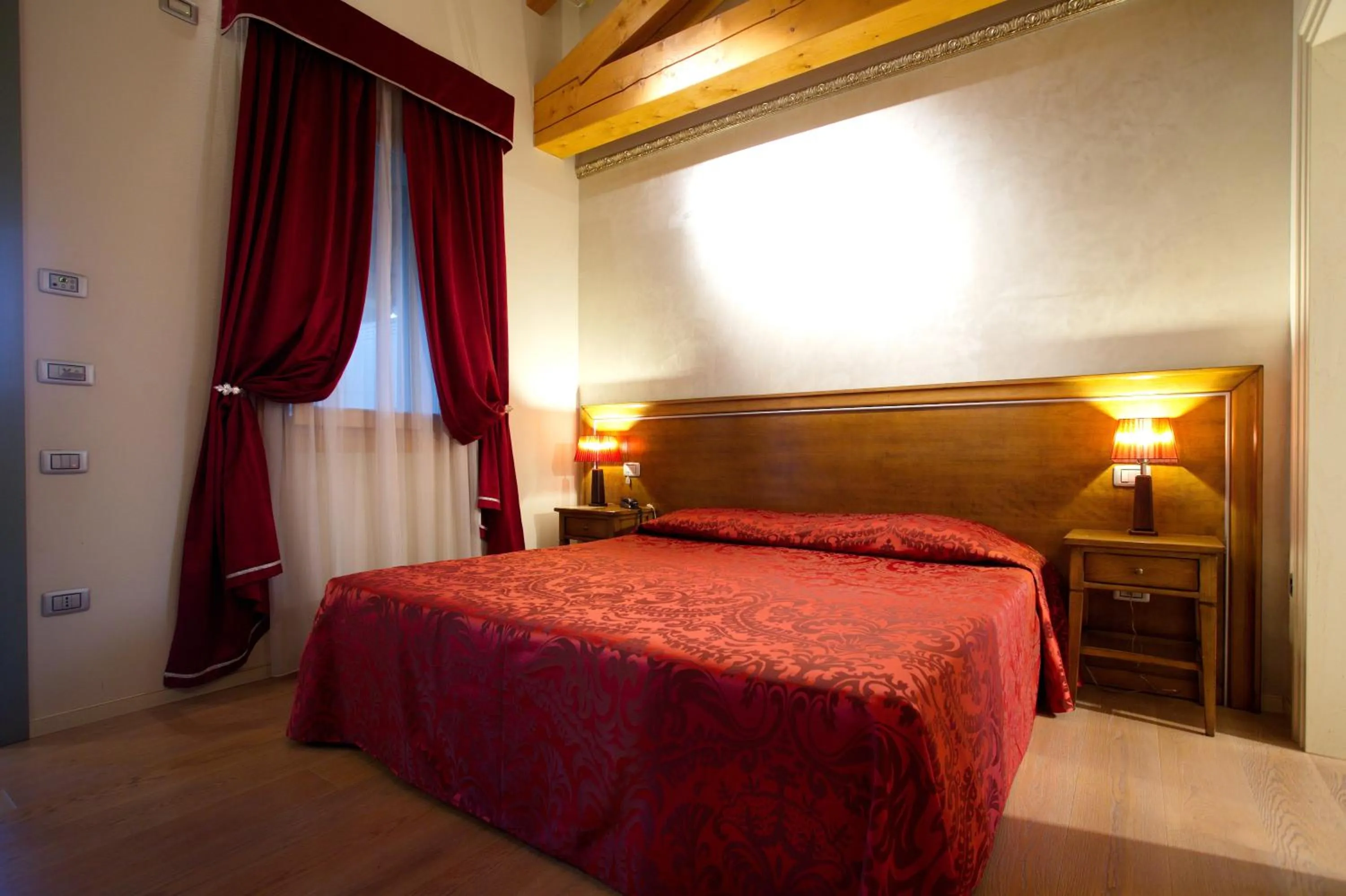 Bed in Hotel Asolo