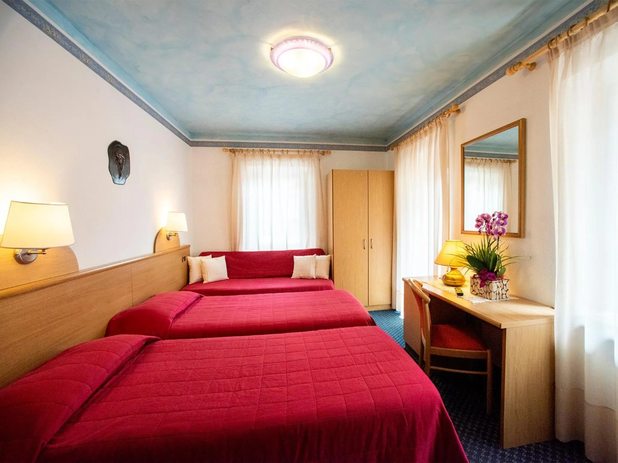 Bed in Hotel Adriana