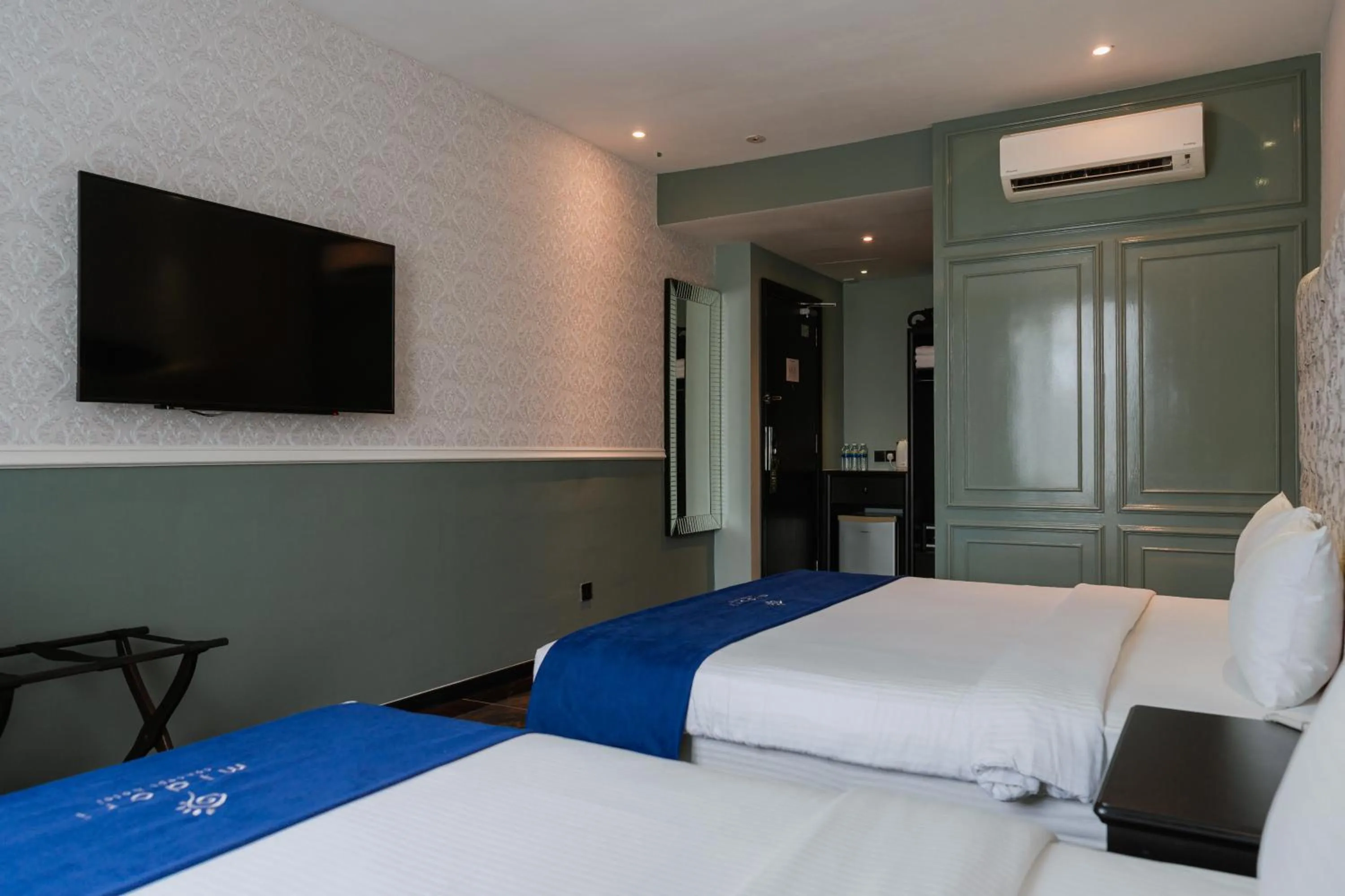 Bed in Midori Concept Hotel