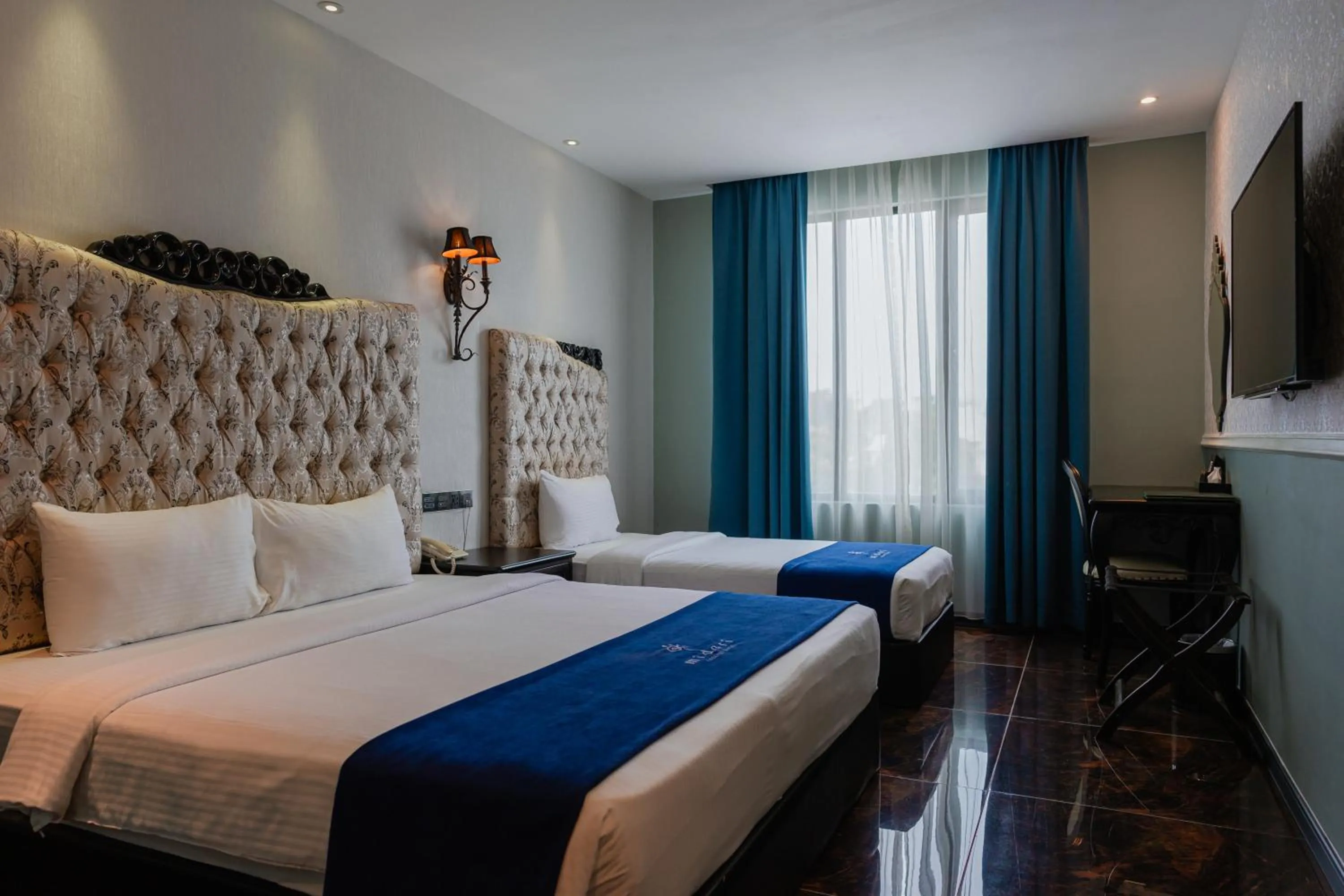 Bed in Midori Concept Hotel