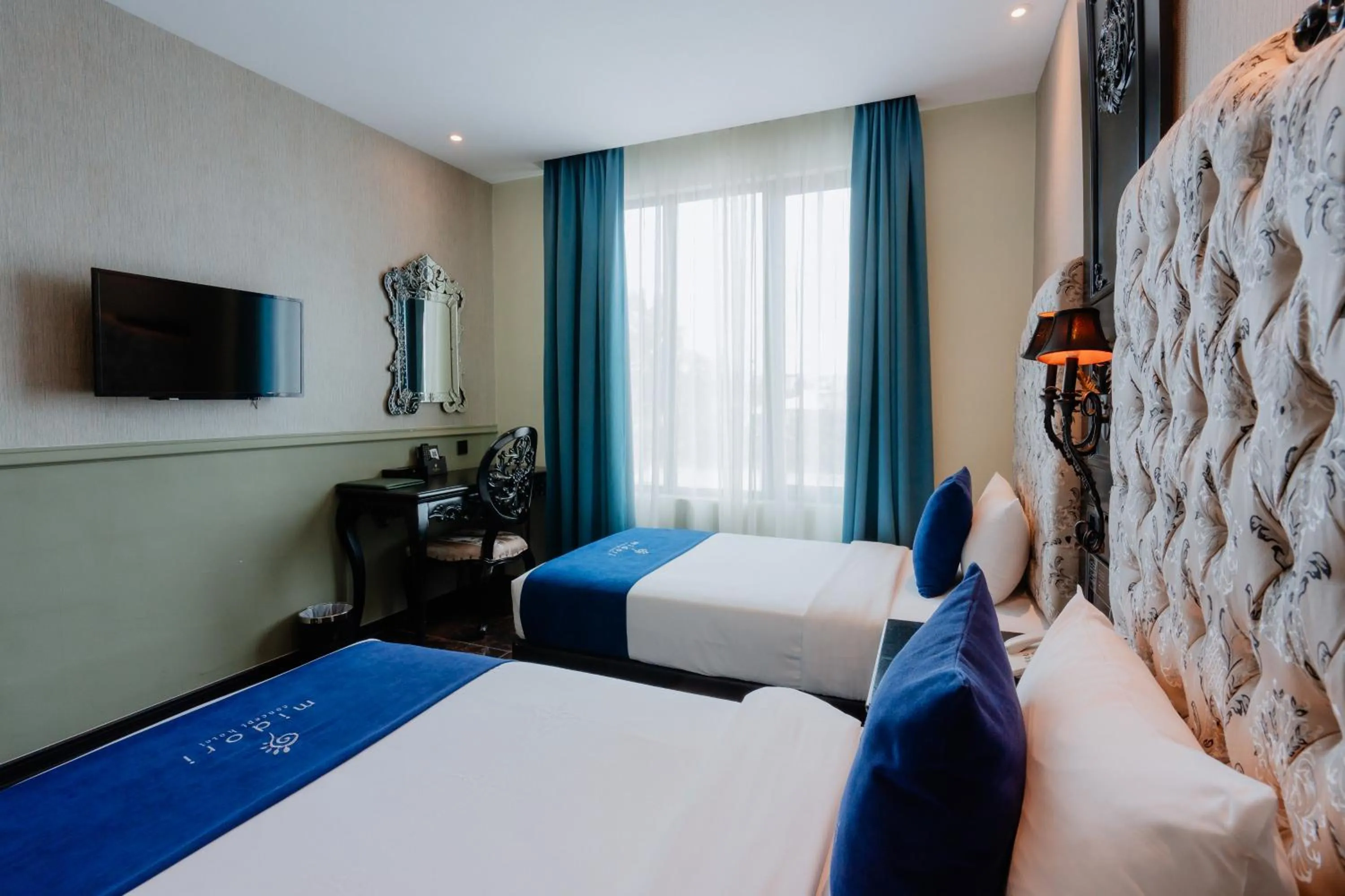 Bed in Midori Concept Hotel