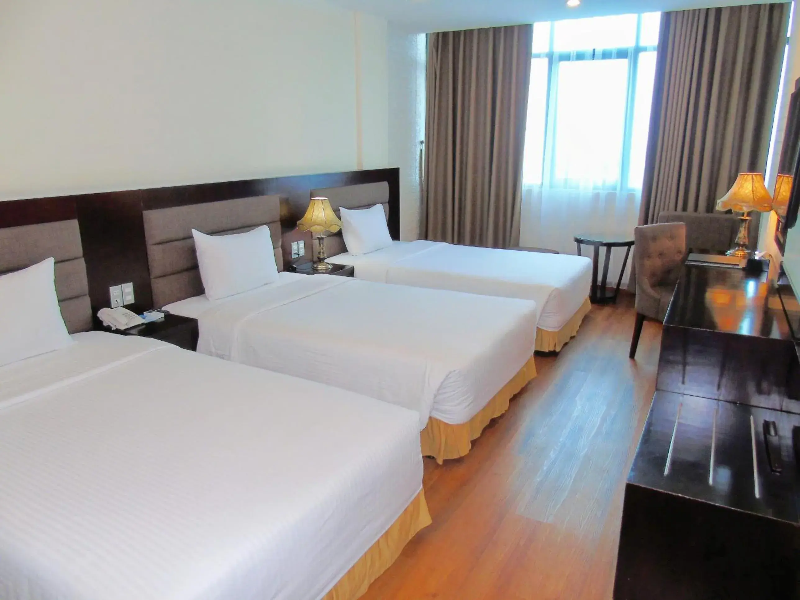 Deluxe Triple Room in Muong Thanh Vinh Hotel Deluxe Triple Room in Muong Thanh Vinh Hotel