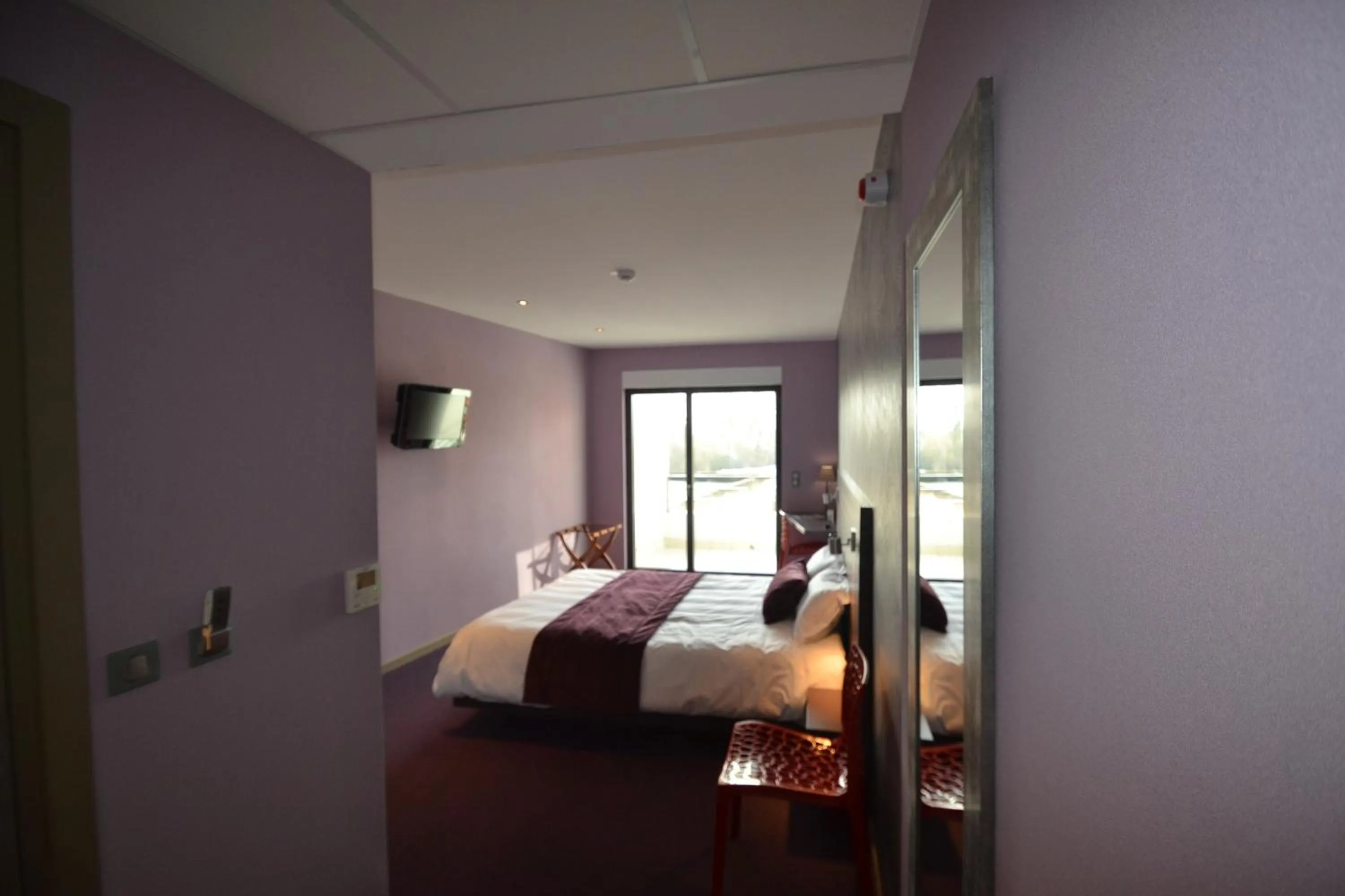 Photo of the whole room, Bed in Hôtel Restaurant Les Alizés