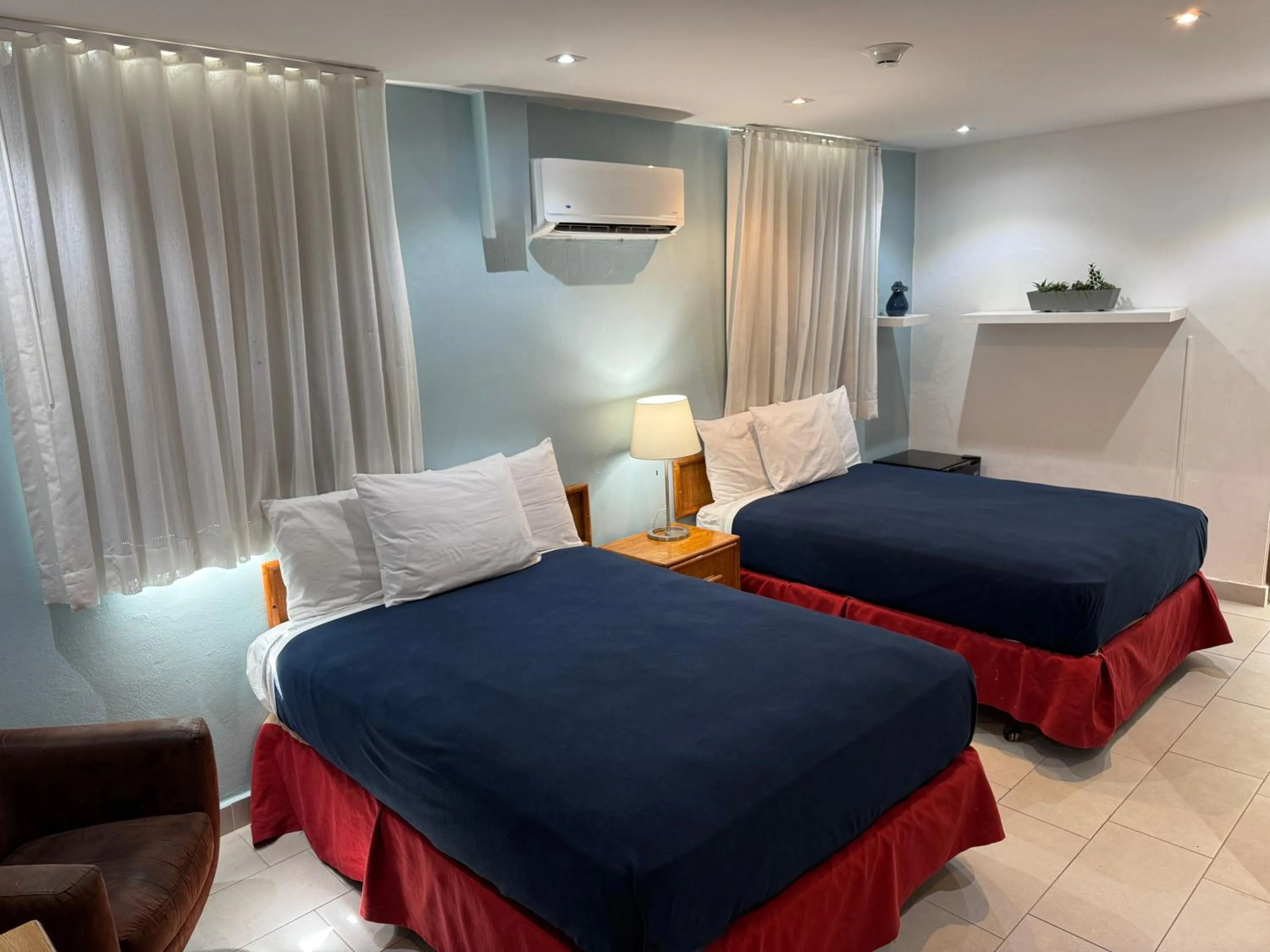 Bed in Sandy Beach Hotel