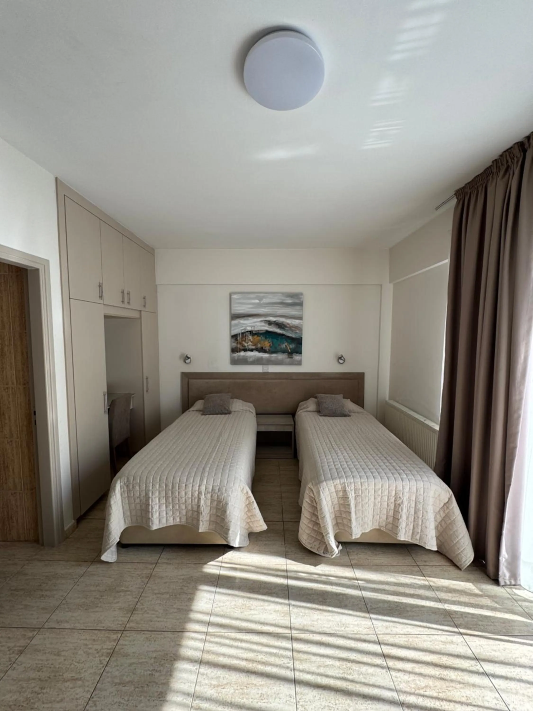 Bed in Marianna Hotel Apartments