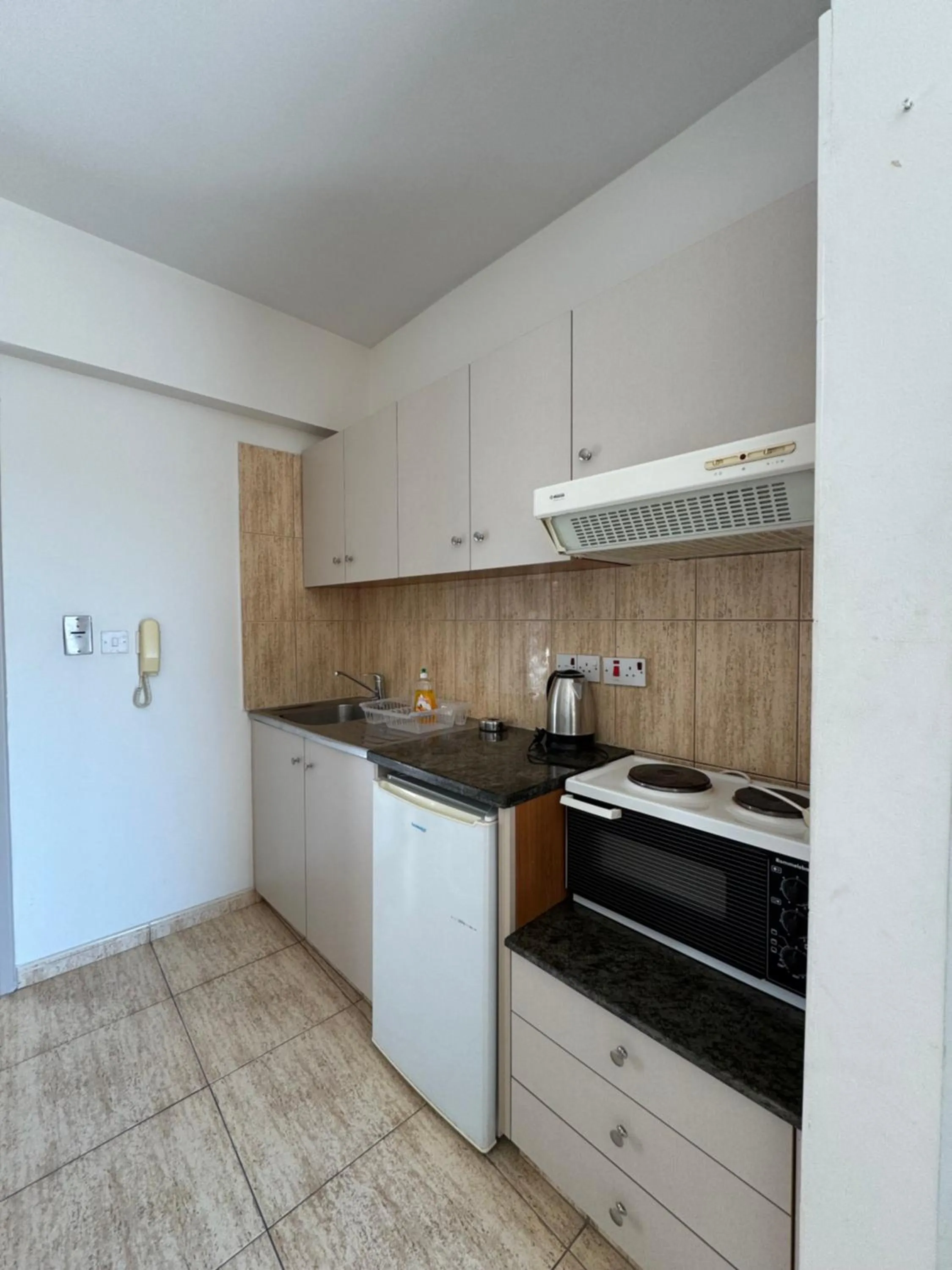 Kitchen or kitchenette in Marianna Hotel Apartments