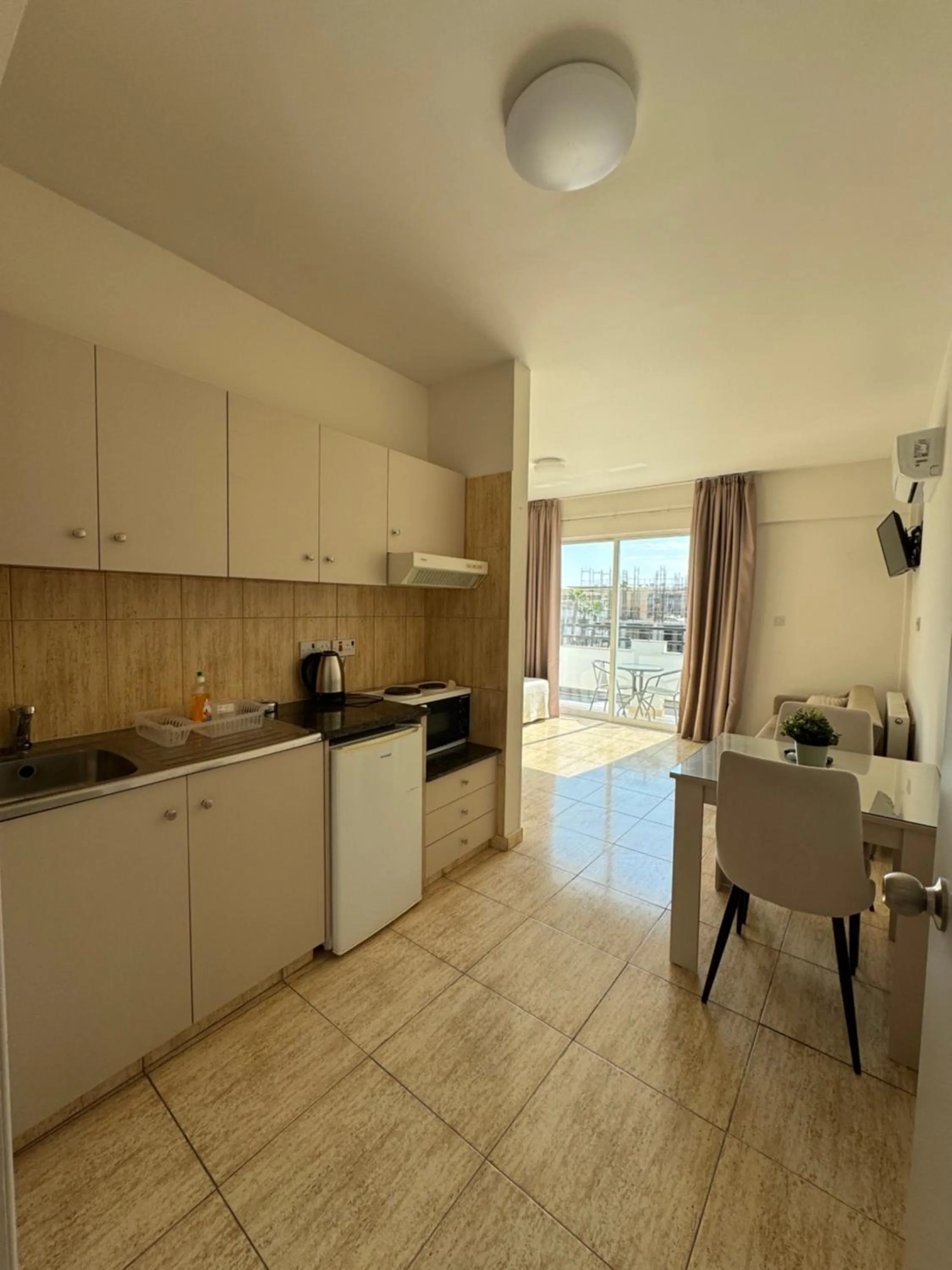 Kitchen or kitchenette in Marianna Hotel Apartments