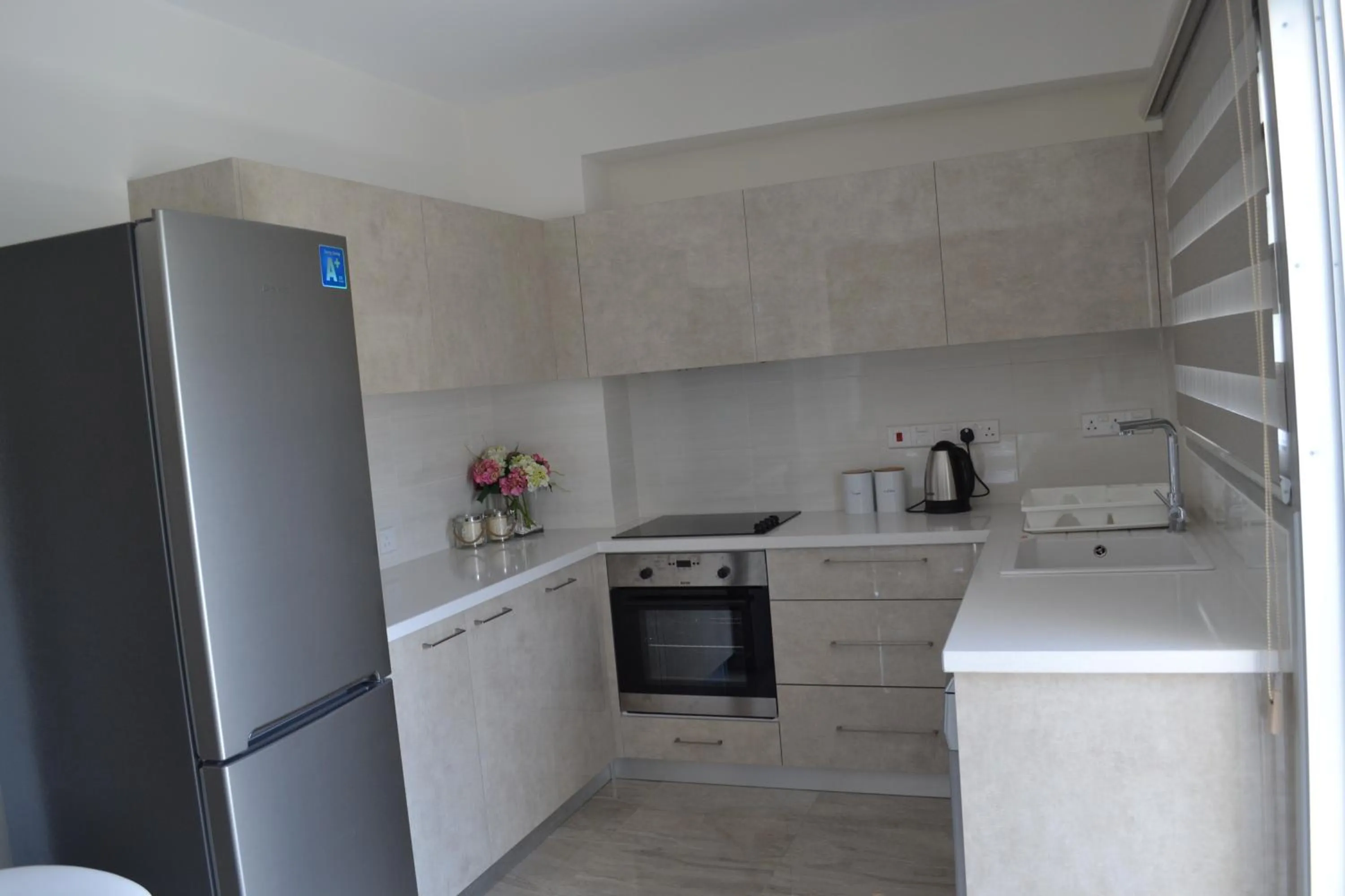 Kitchen or kitchenette in Marianna Hotel Apartments