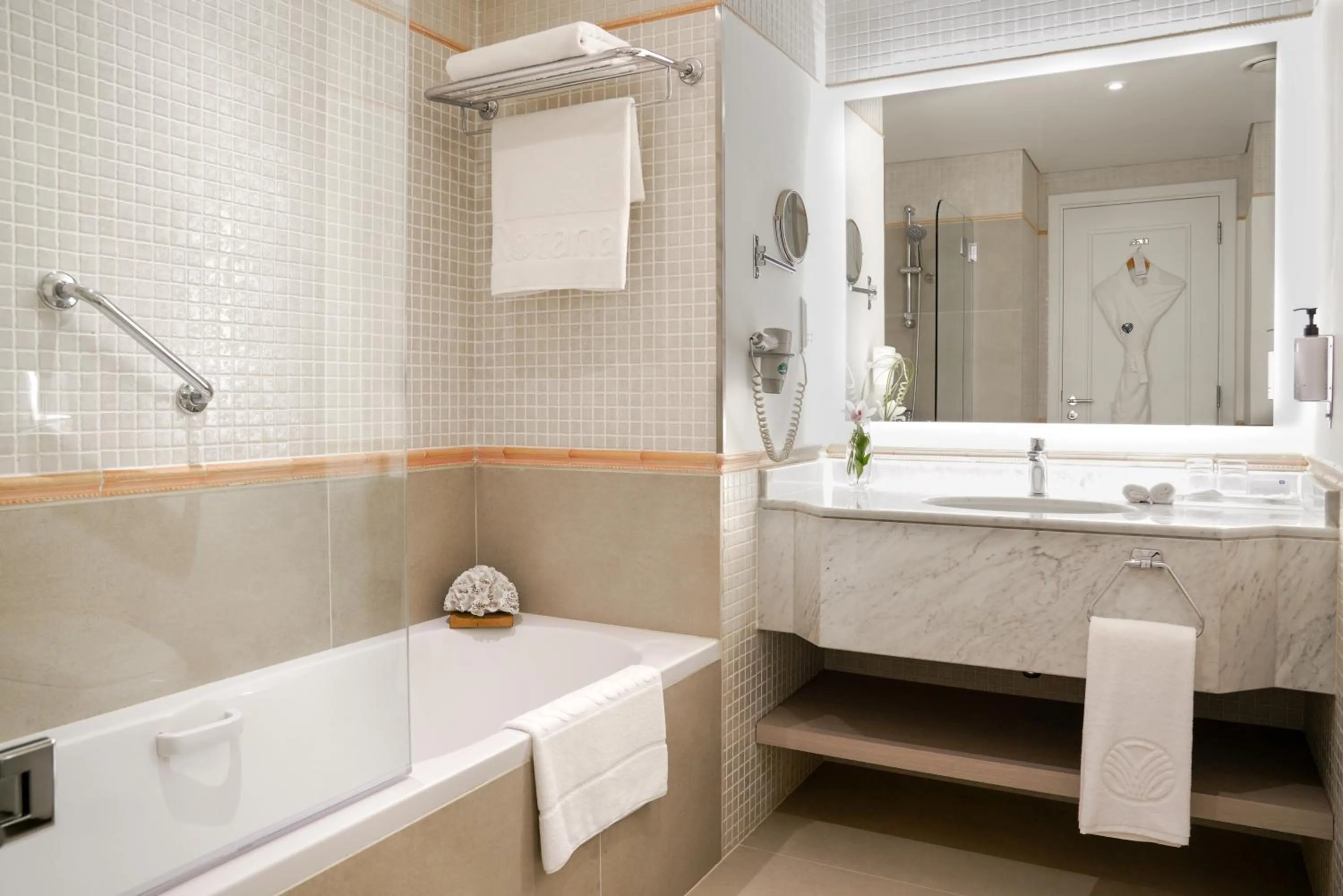 Bathroom in Beach Rotana – All Suites
