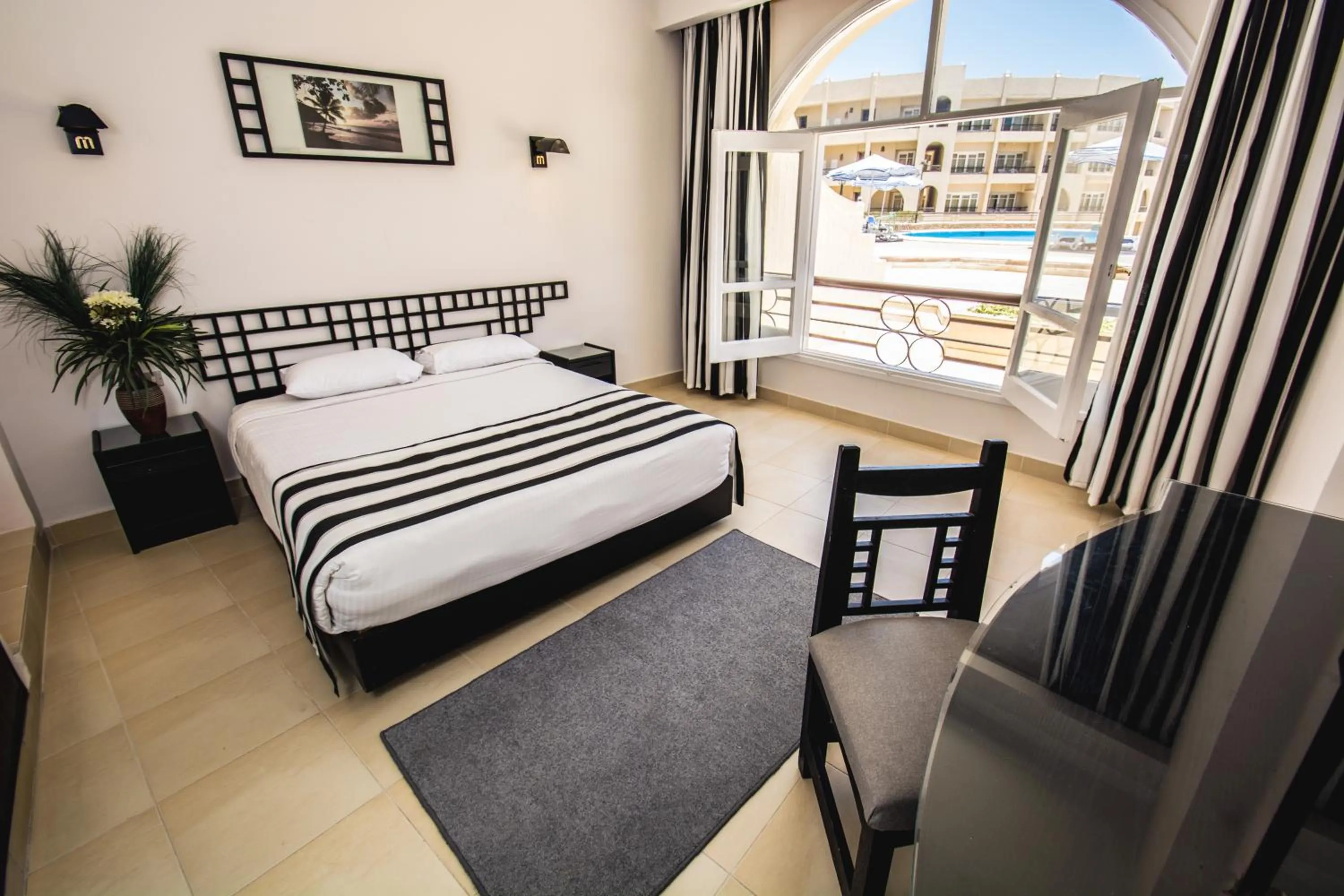 Bed in Sunny Days Mirette Family Resort