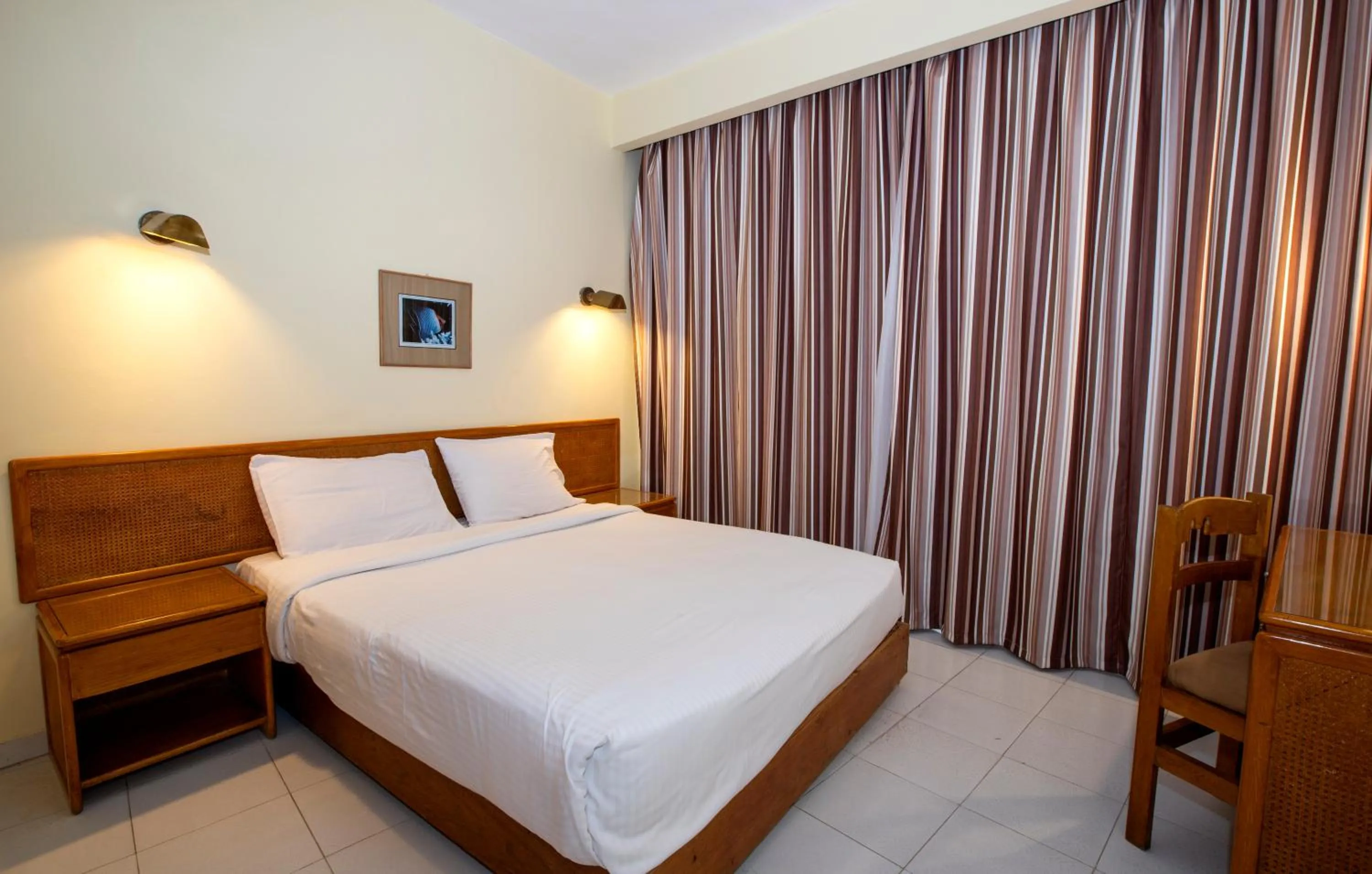 Bed in Sunny Days Mirette Family Resort