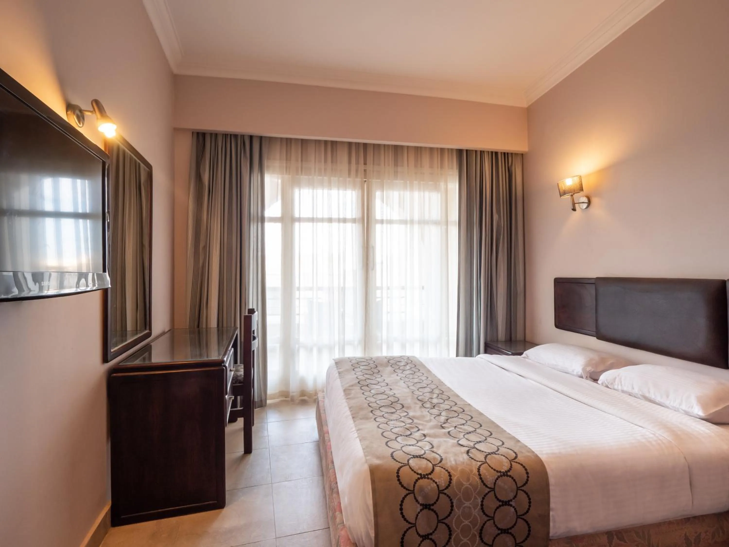 Bed in Sunny Days Mirette Family Resort