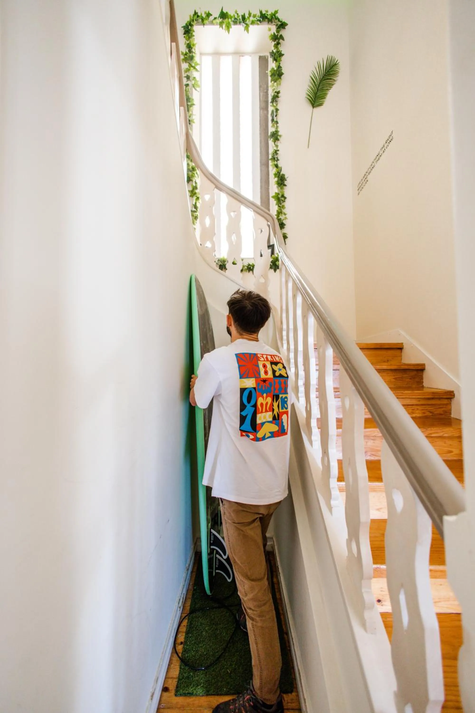 People in Green Coast Surf House