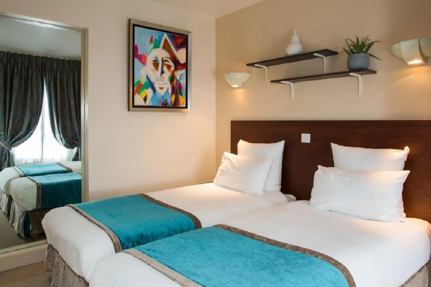 Bed in Queens Boutique Hotel