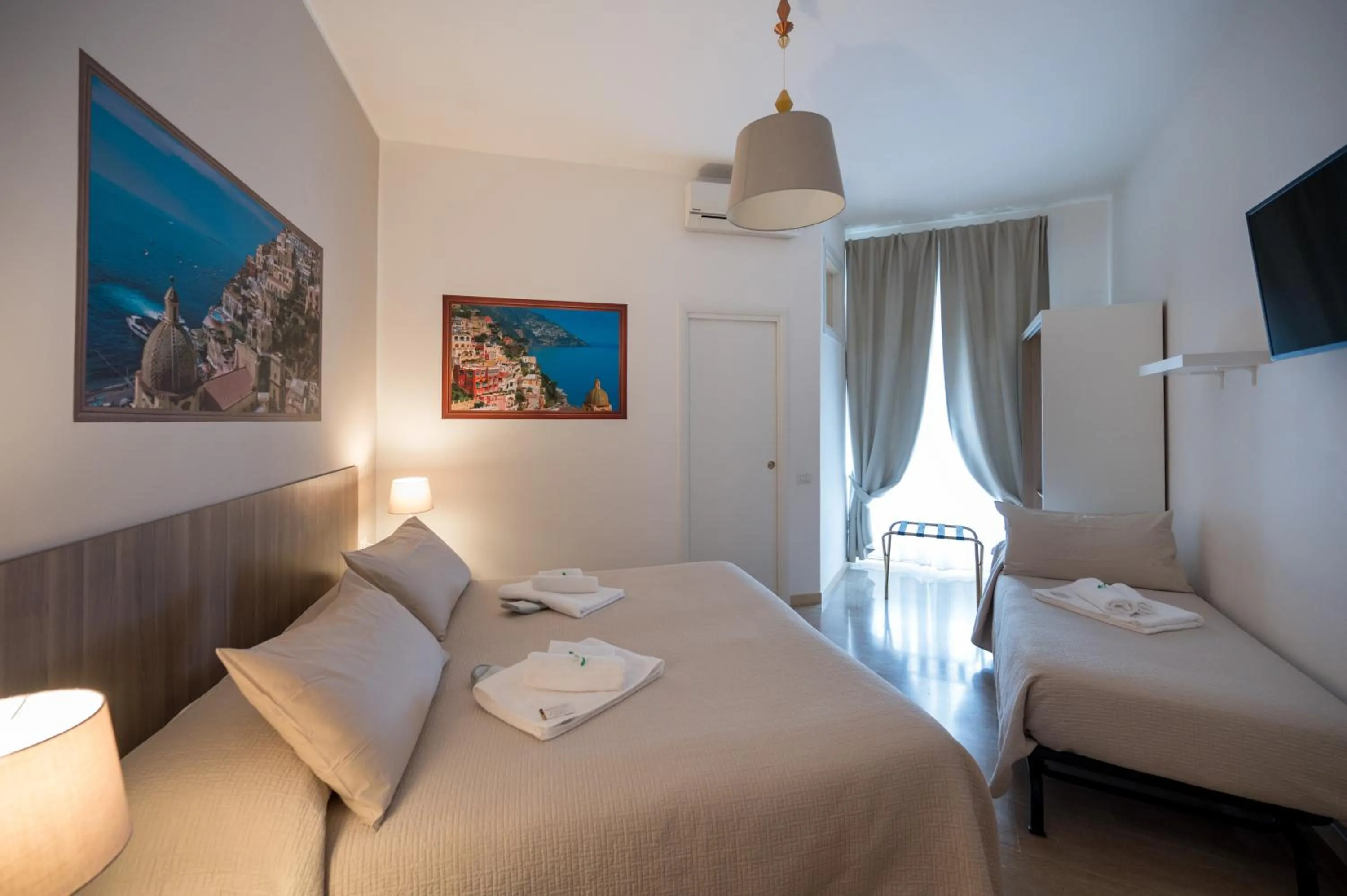 Photo of the whole room, Bed in Panoramic Rooms Salerno