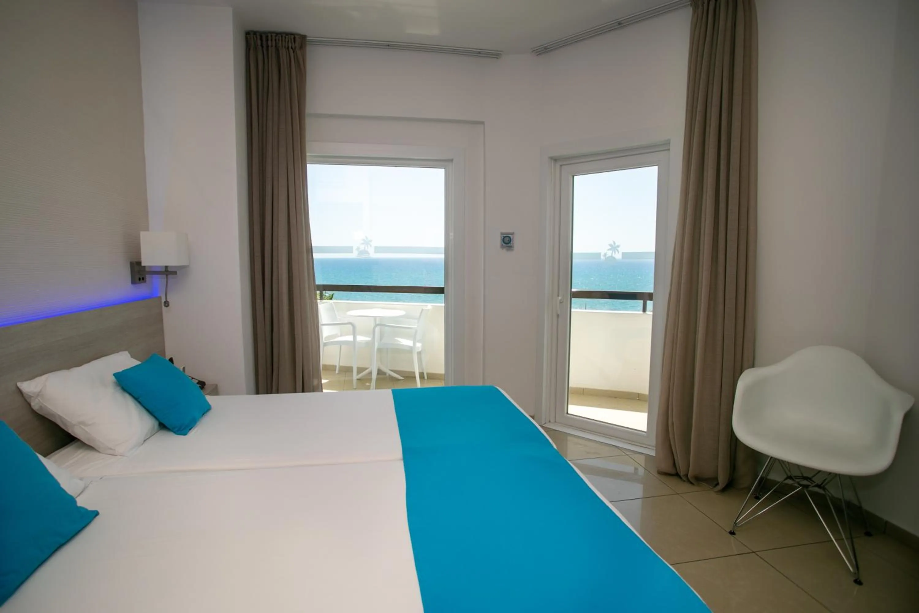 Bedroom, Bed in Les Palmiers Beach Boutique Hotel & Luxury Apartments