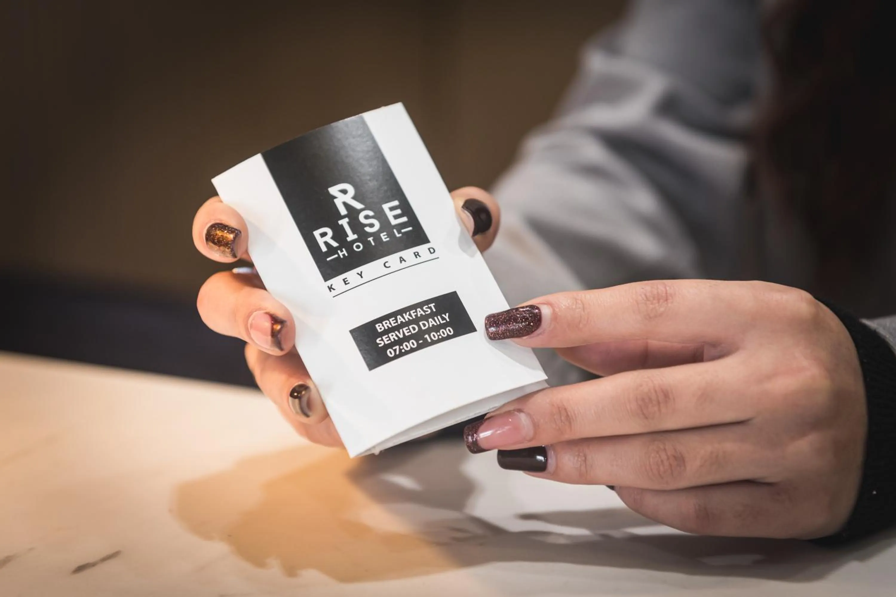 Property logo or sign in Rise Urban Art Hotel