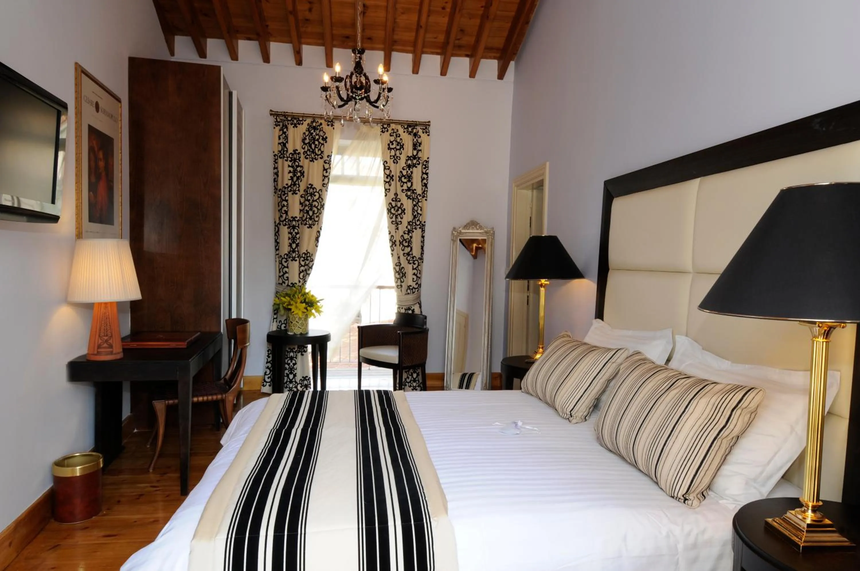 Bed in The Library Hotel Wellness Retreat