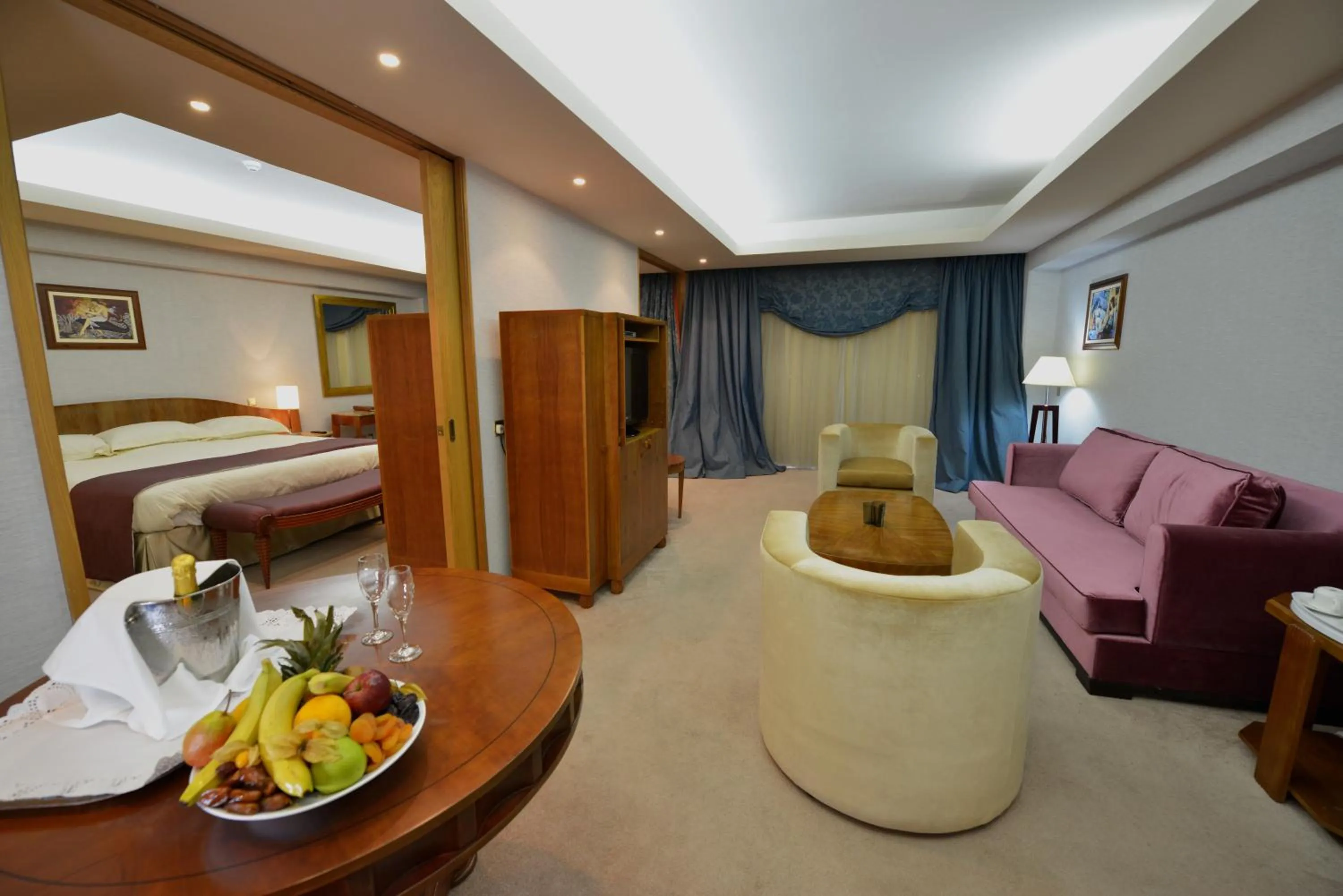 Seating area, Bed in Adams Beach Hotel & Spa