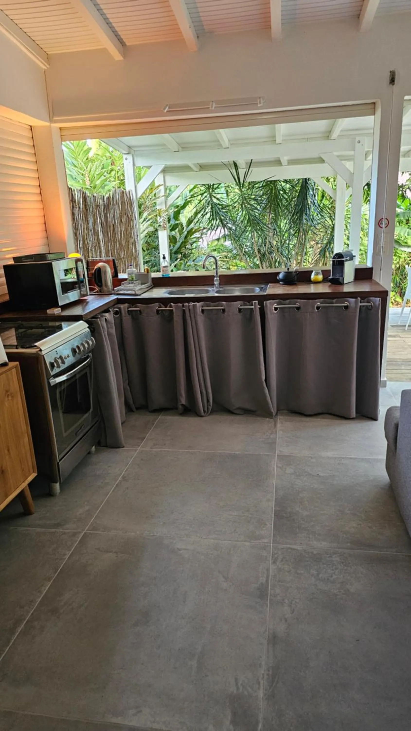 Kitchen or kitchenette in Habitation Villa Les Cassias