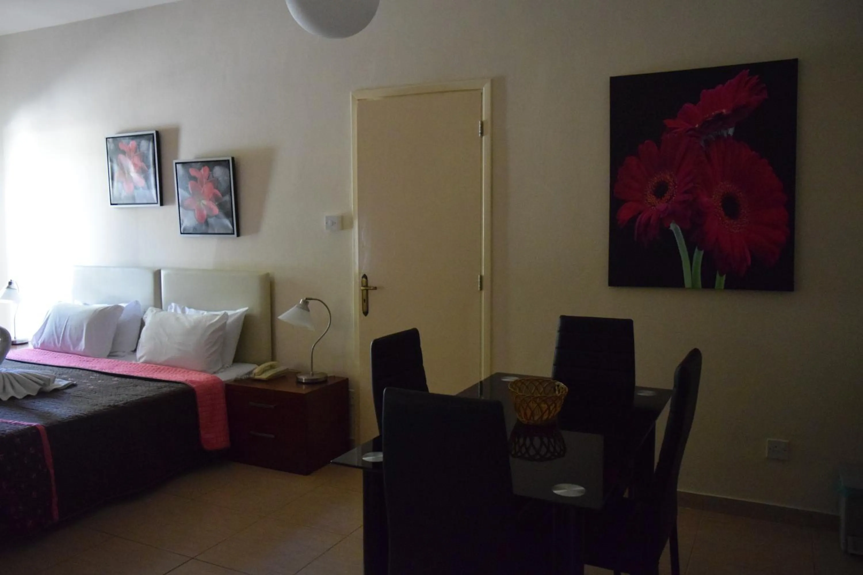 Seating area, Bed in Anna Hotel Apartments