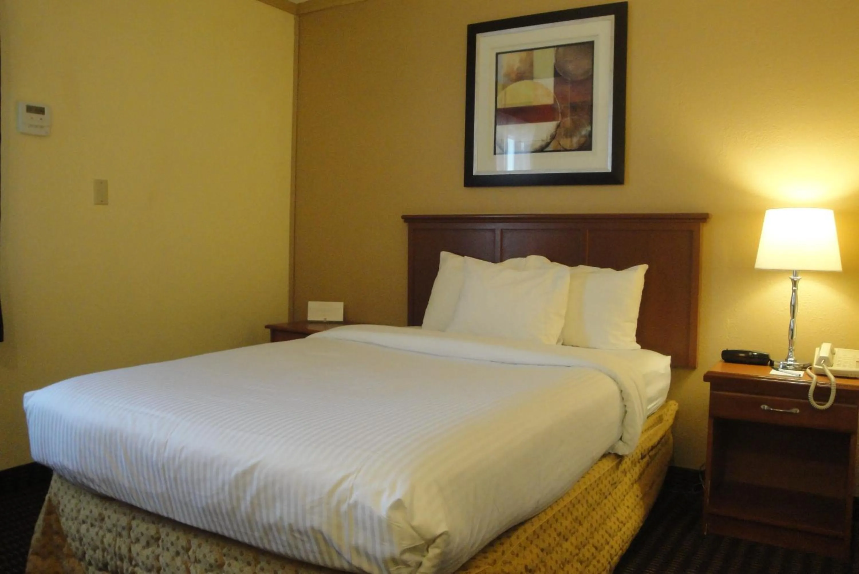 Bed in All Stay Suites