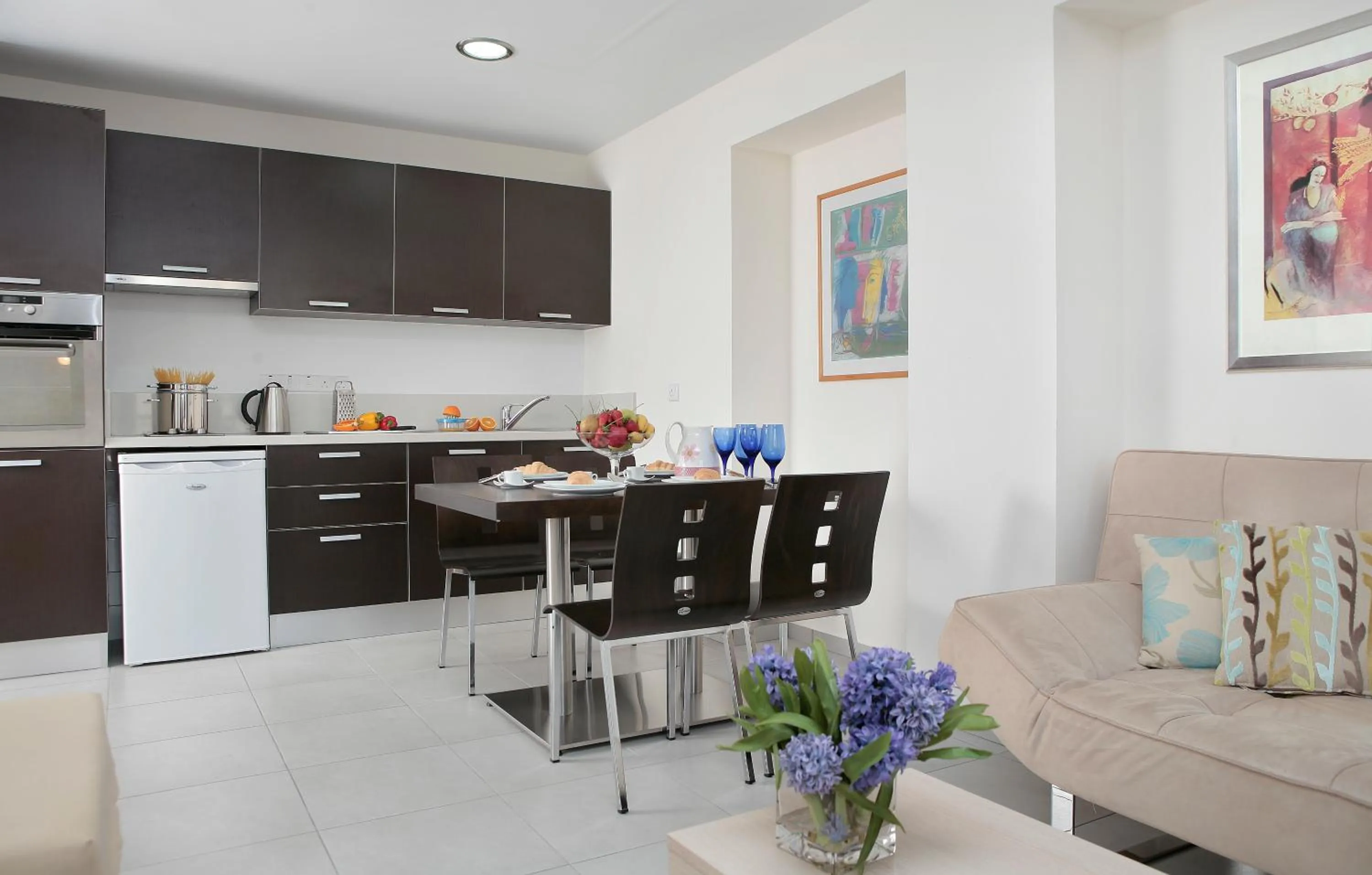 Kitchen or kitchenette in Anemi Hotel & Suites