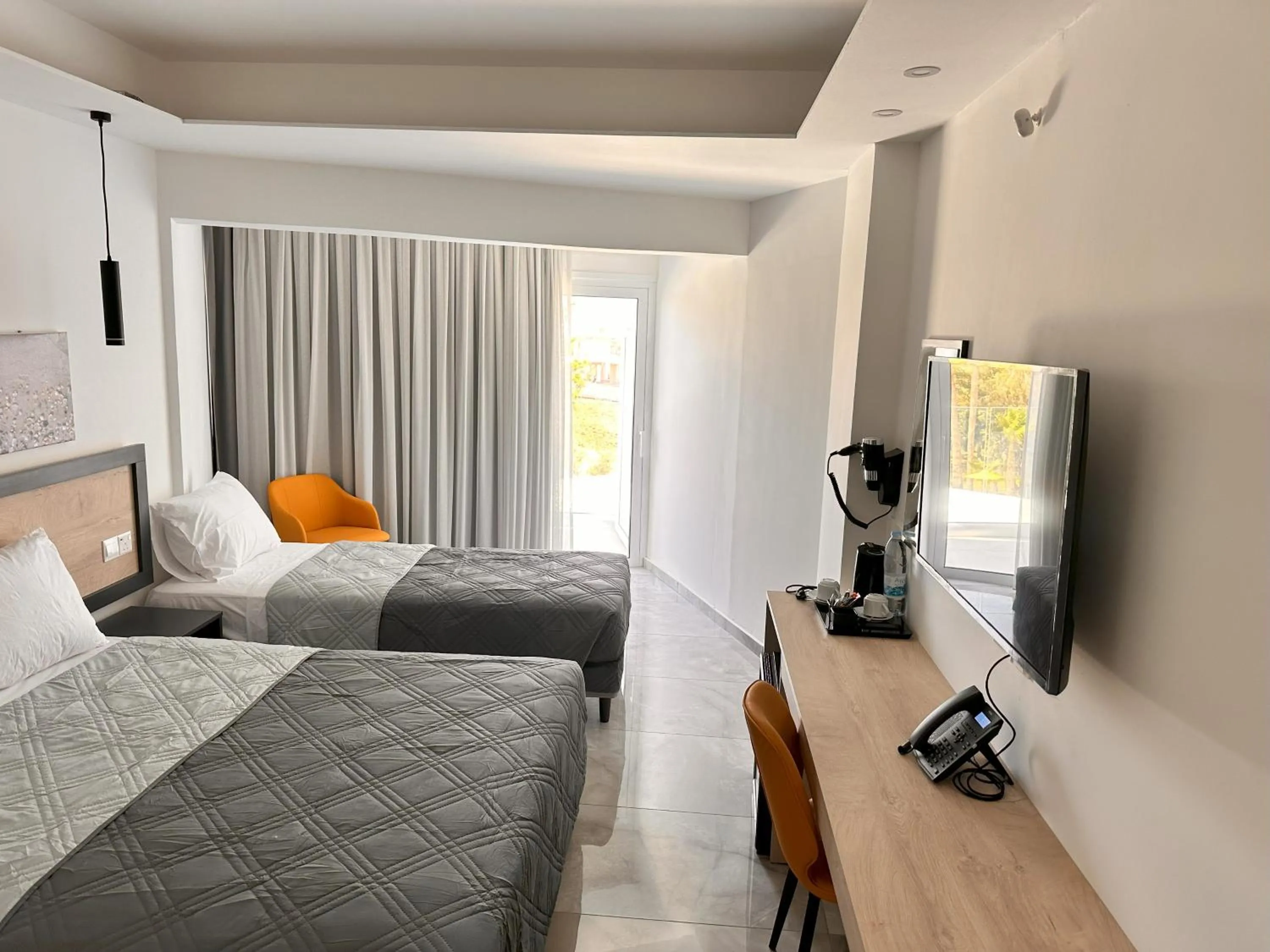 Bed in Papouis Protaras Hotel