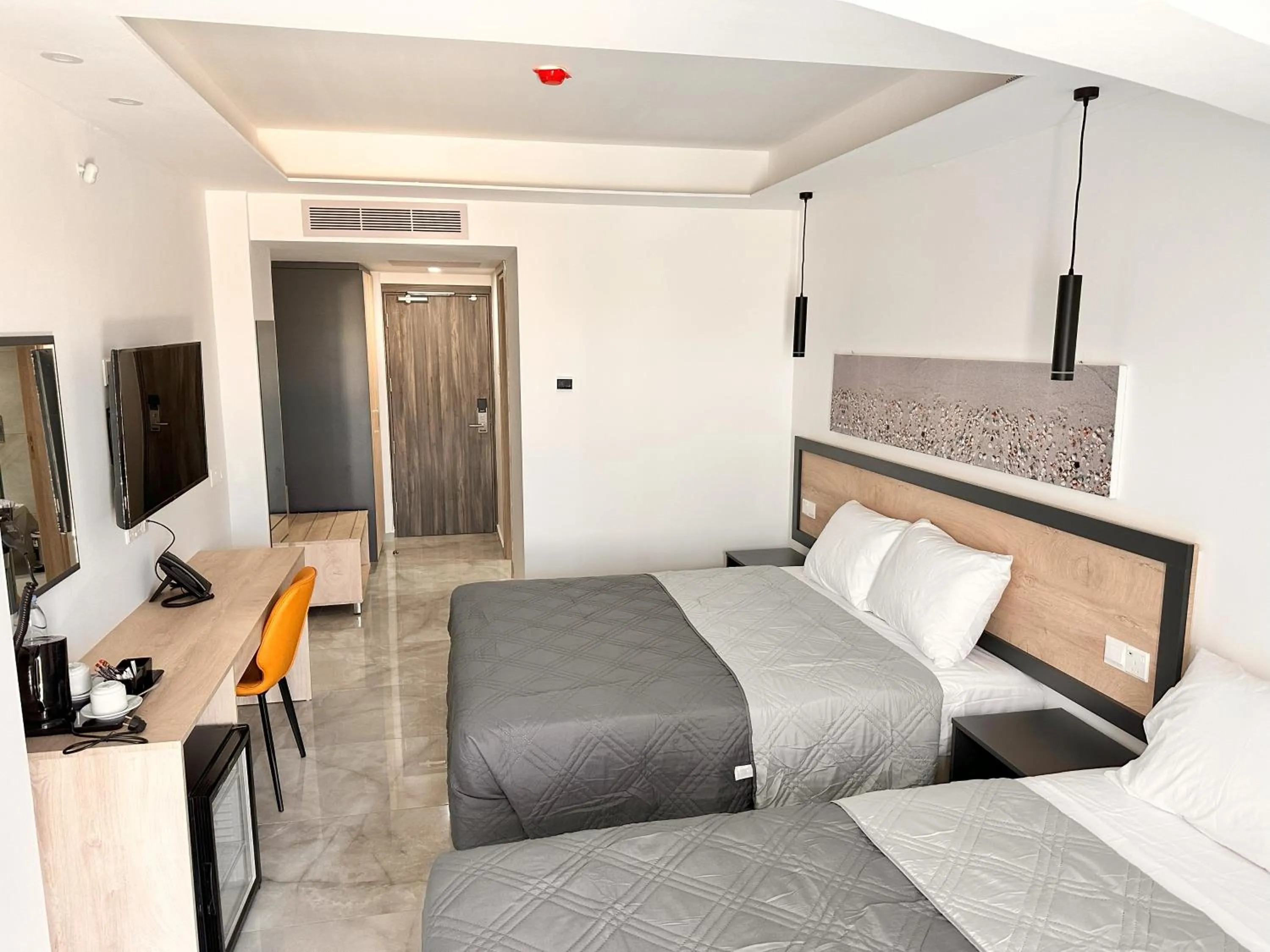 Communal lounge/ TV room, Bed in Papouis Protaras Hotel