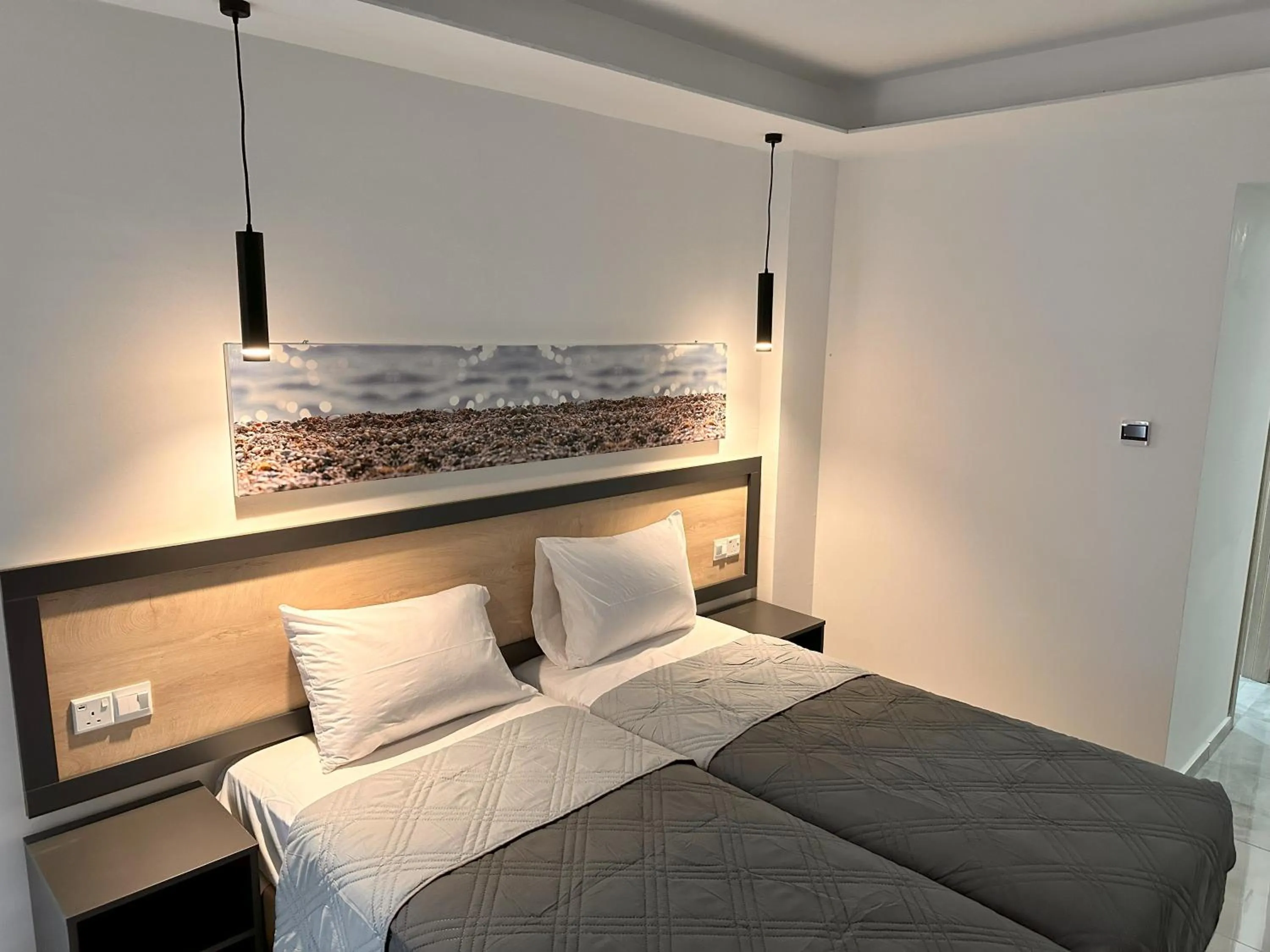 Bed in Papouis Protaras Hotel