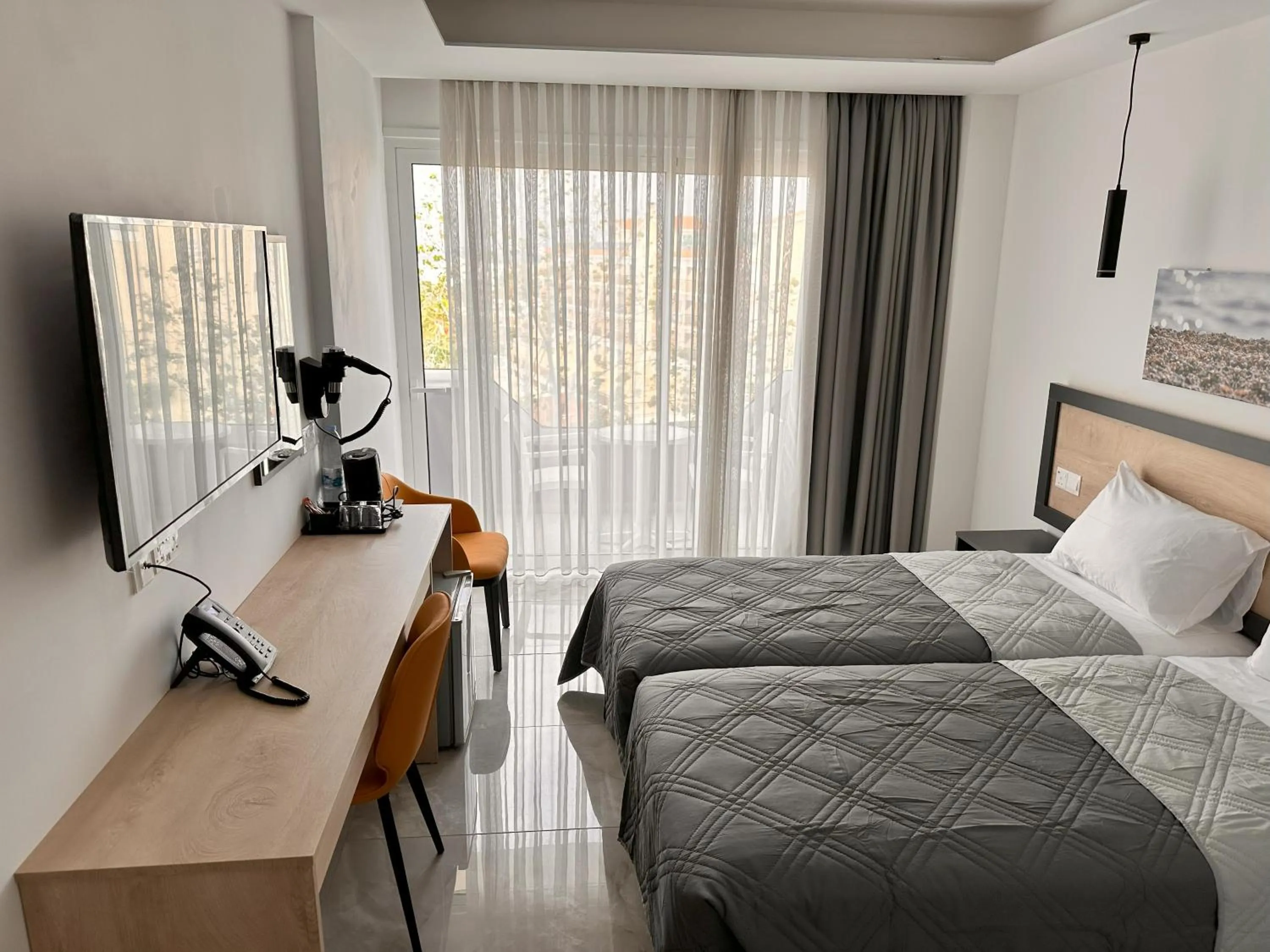 Bed in Papouis Protaras Hotel