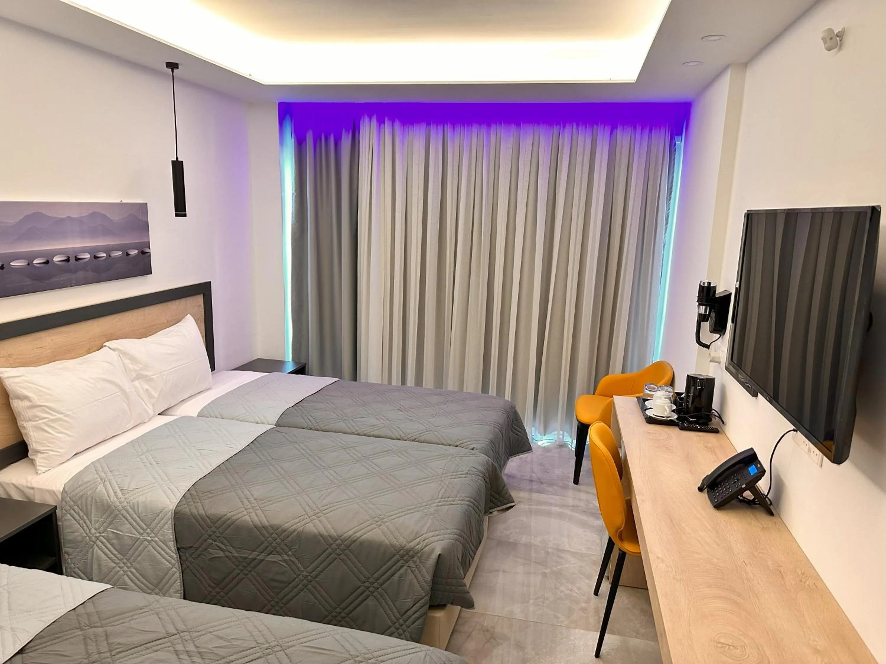 Bed in Papouis Protaras Hotel