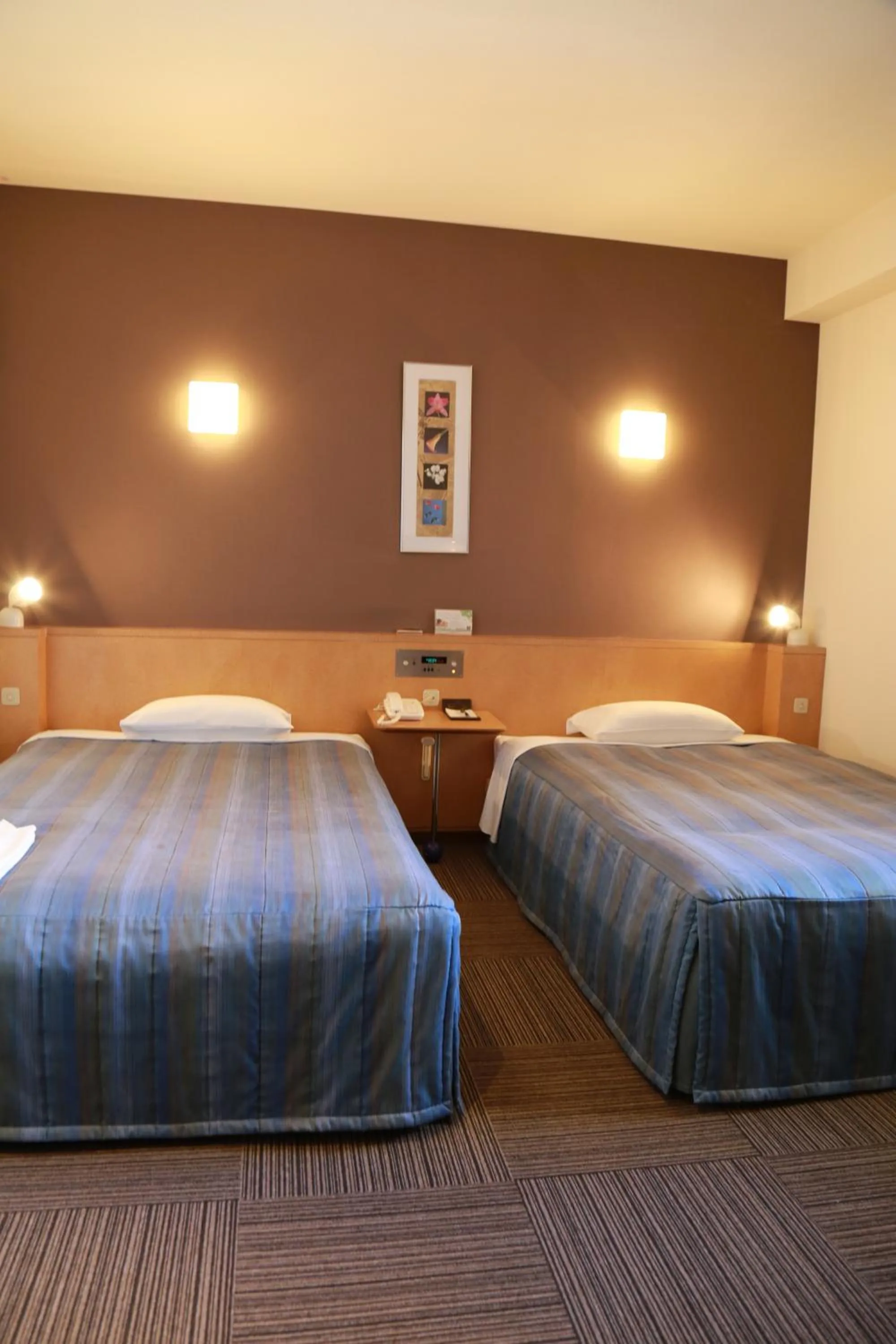 Bed in Hotel Plaza Arakawaoki