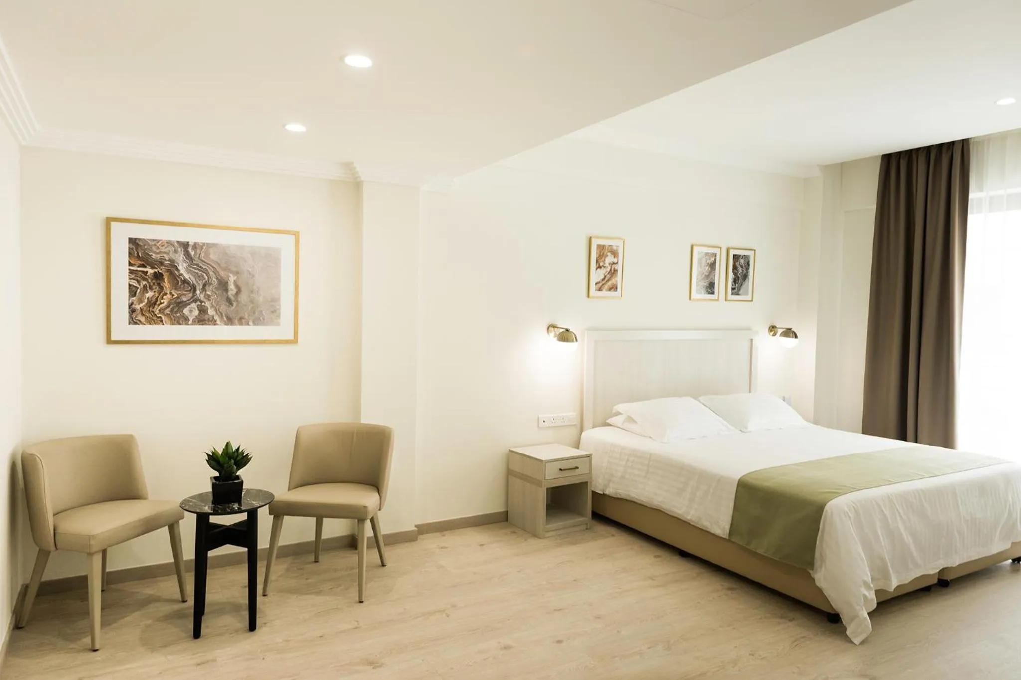 Bed in Roseum Boutique Hotel